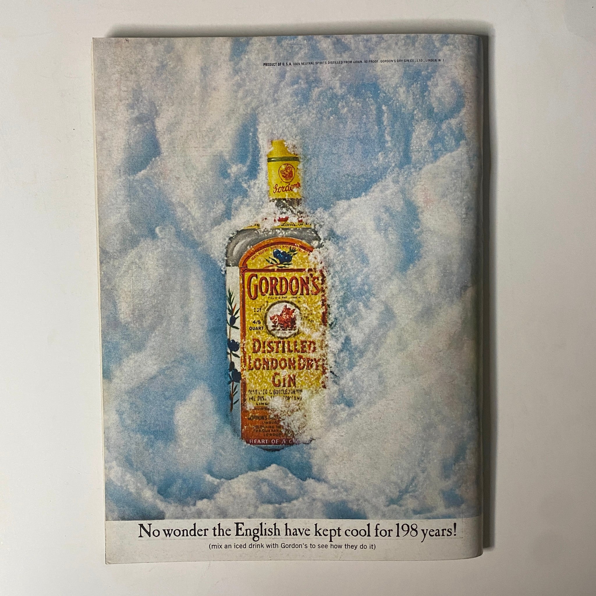 Advertisement page from Playboy Magazine September 1967 featuring Gordon's Distilled London Dry Gin, set against a blue cloud background.