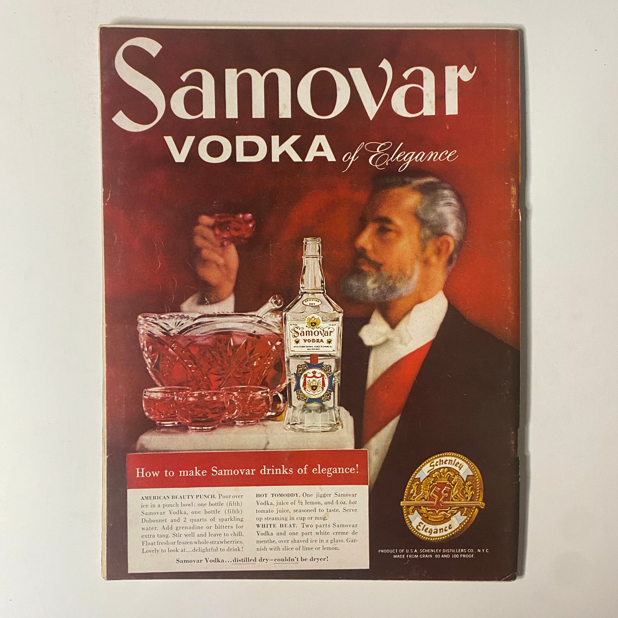 Vintage advertisement for Samovar Vodka from Playboy Magazine February 1958, showcasing a stylish drink presentation and a gentleman.
