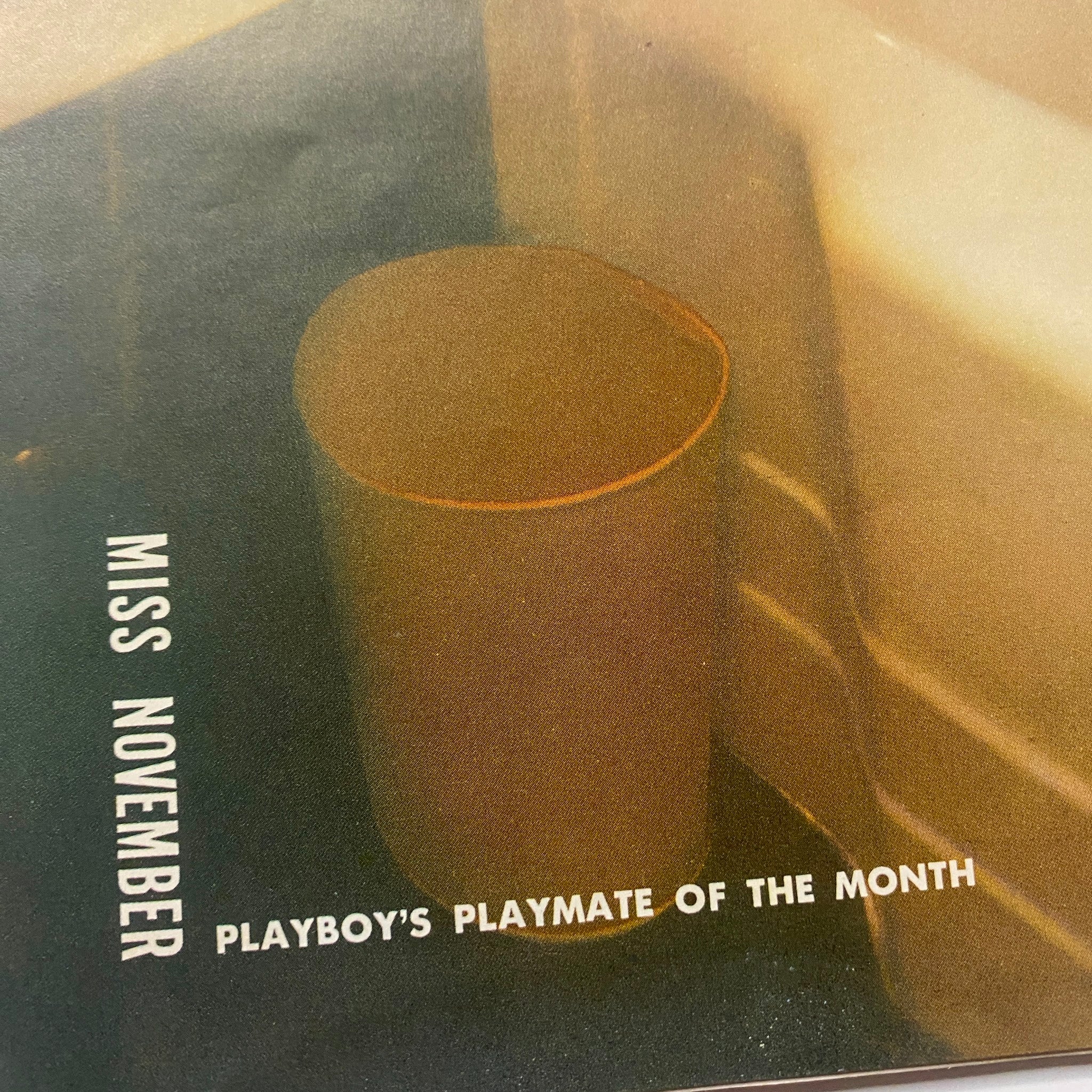 Cover image of Playboy Magazine November 1955 featuring Barbara Cameron as Playmate of the Month, highlighting the text 'Miss November' and the announcement of 'Playboy's Playmate of the Month'.