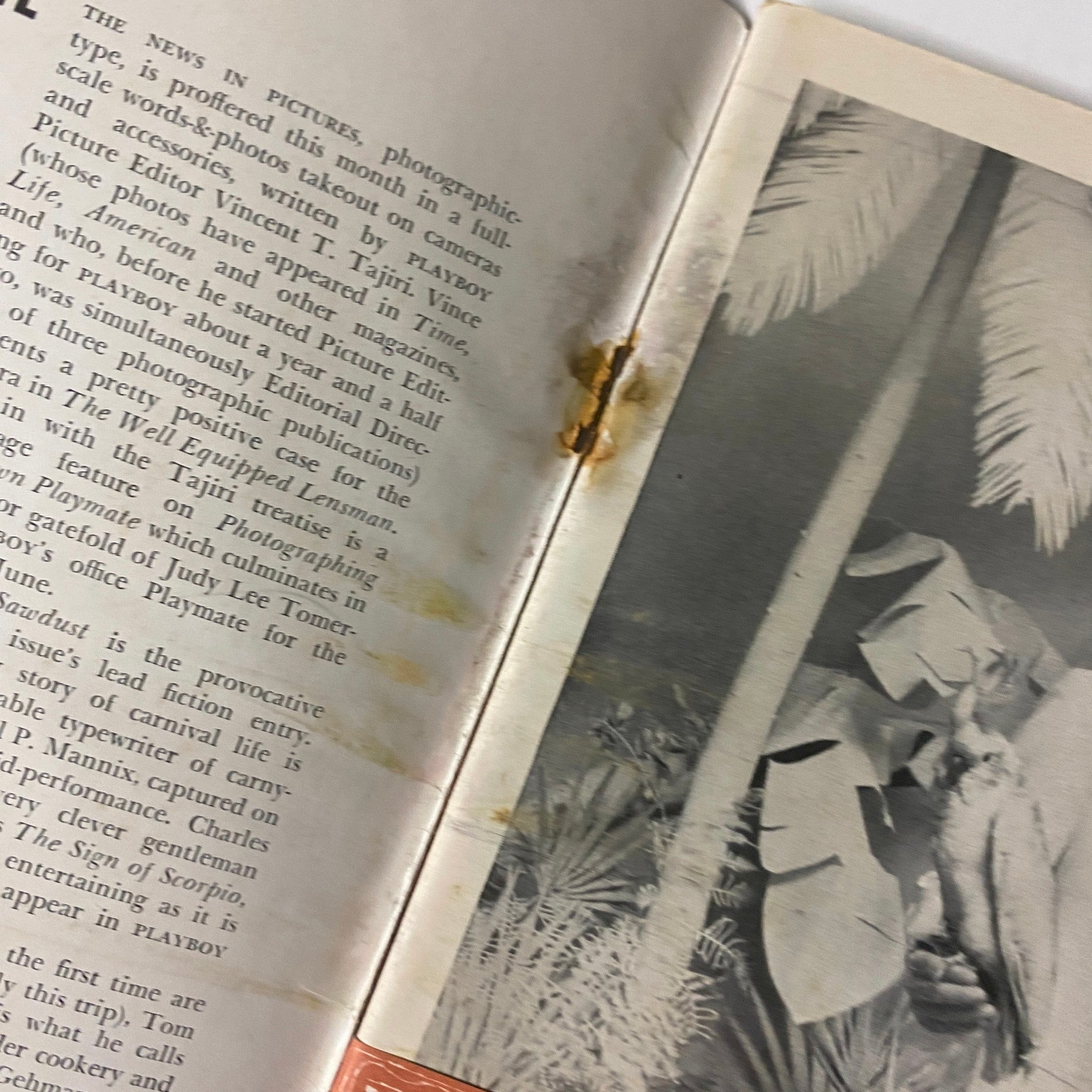 Interior page of Playboy Magazine, June 1958, revealing signs of wear including water damage, with text highlighting content related to photography and lifestyle, featuring Judy Lee Tomerlin as Playmate of the Month.