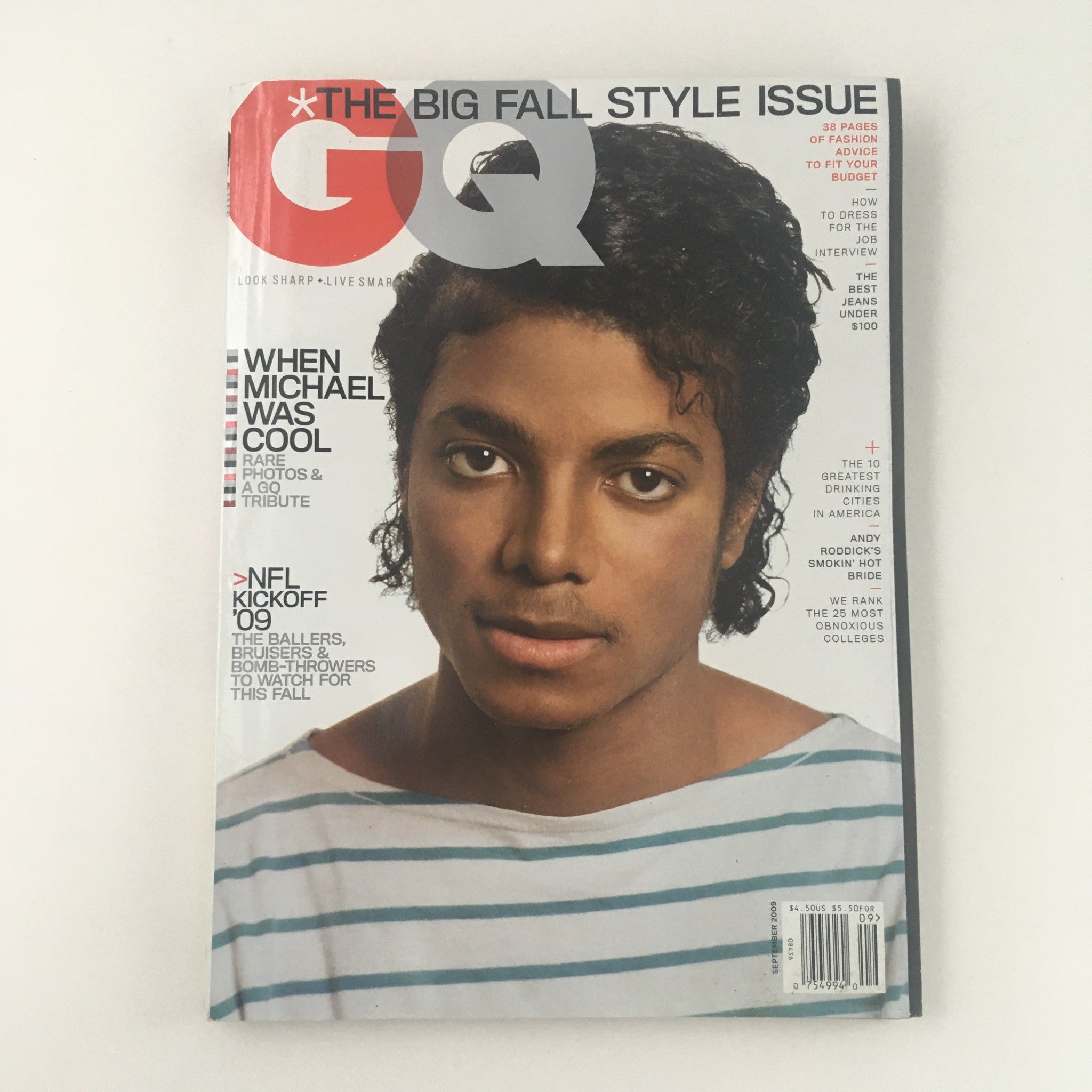 GQ Magazine September 2009 issue titled 'When Michael Jackson Was Cool', featuring a striking portrait of Michael Jackson on the cover. This vintage magazine captures the essence of pop culture and fashion from the late 2000s, perfect for collectors and fans of music history.