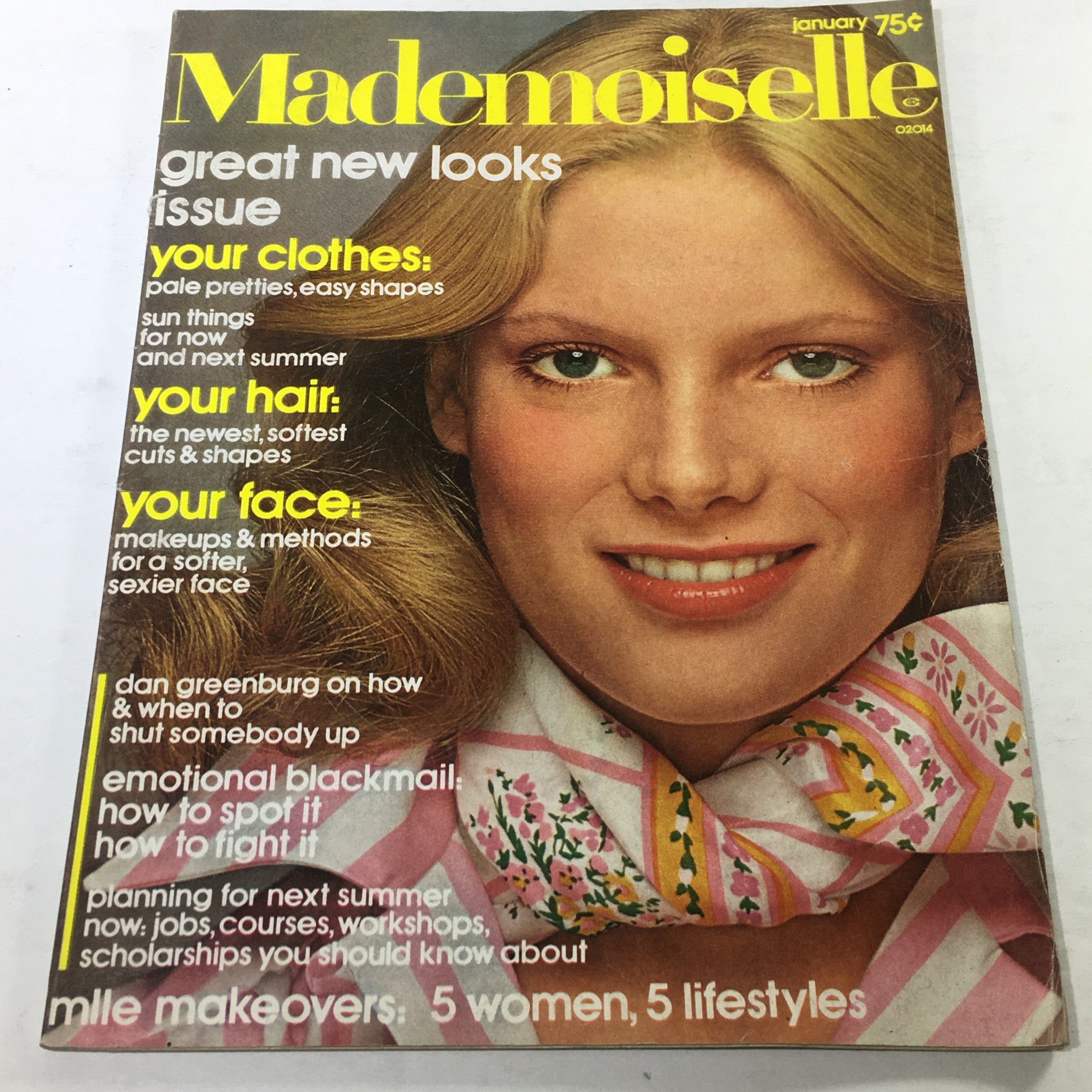 VTG Mademoiselle Magazine January 1975 front cover showcasing the great new looks issue with vibrant headlines on fashion and beauty, featuring a smiling model with long hair wearing a patterned scarf.