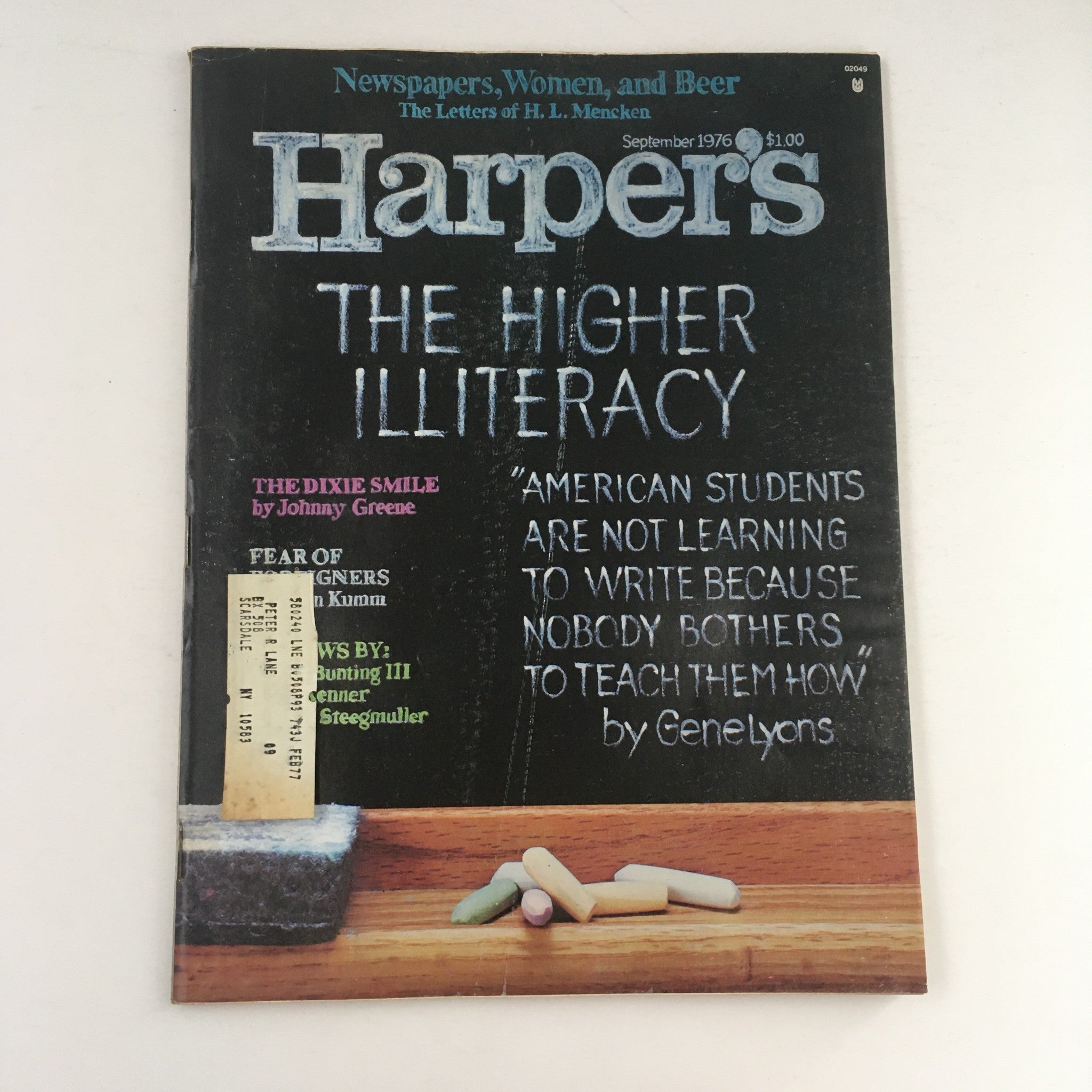 Front cover of Harper's Magazine September 1976 featuring articles on The Higher Illiteracy and The Dixie Smile. The cover displays chalkboard-style lettering and highlights a quote about education.