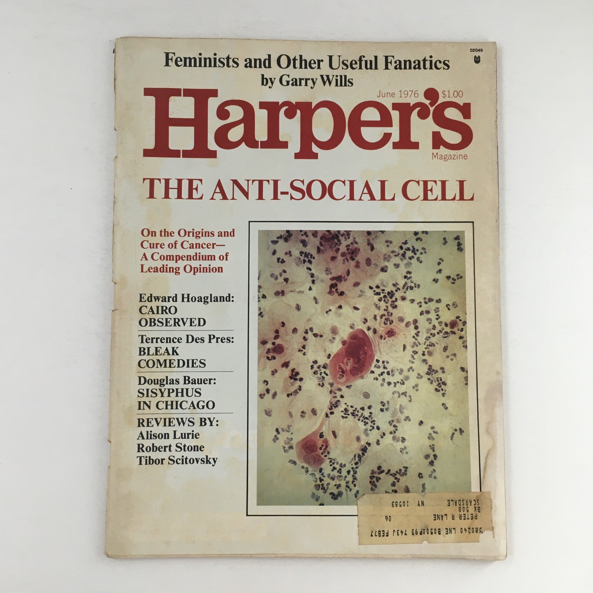 Cover of Harper's Magazine June 1976 featuring the title 'The Anti-Social Cell'. The magazine also includes articles on cancer, Cairo, and book reviews. The cover showcases an image related to cell biology, indicative of the era's cultural explorations.