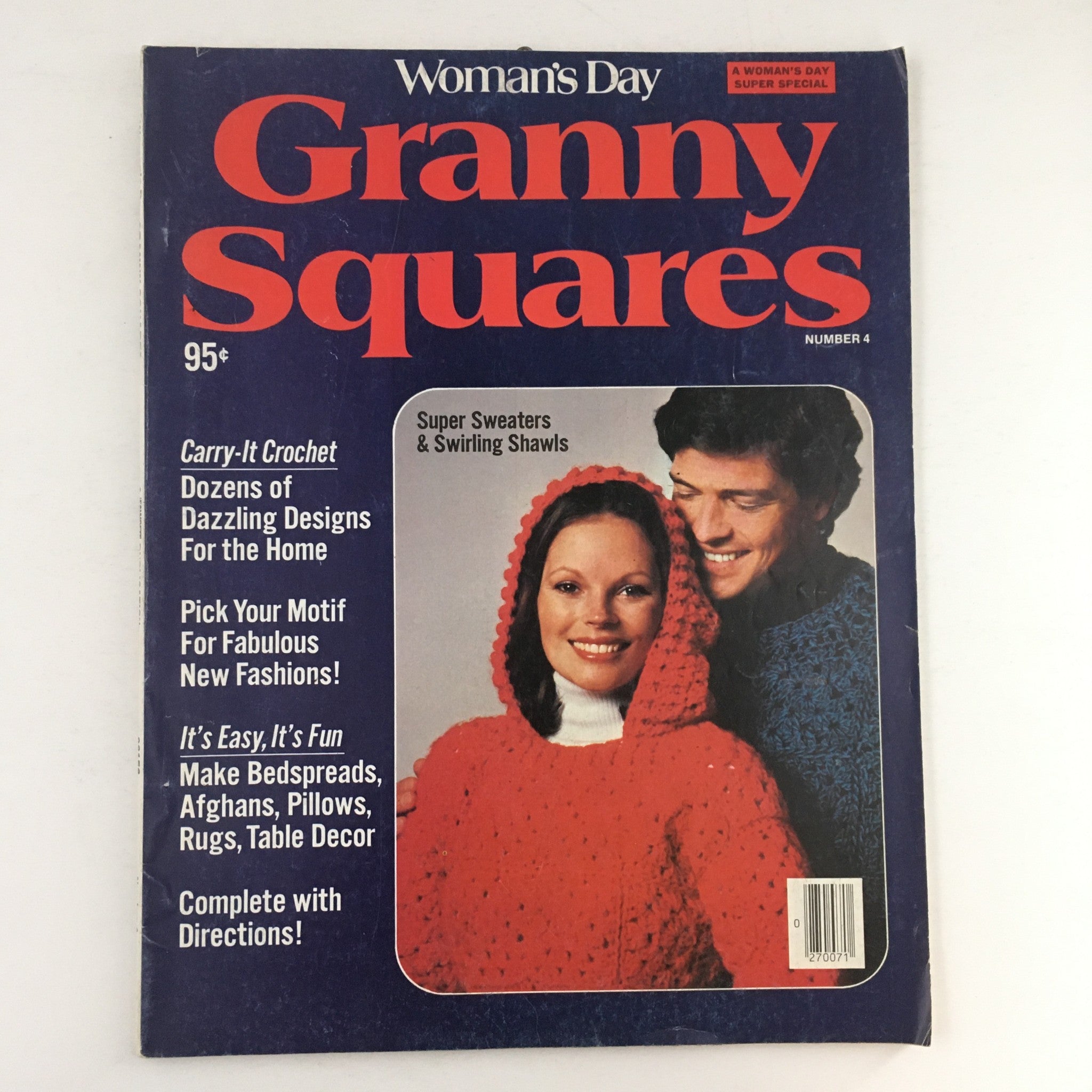 Cover of Woman's Day Magazine #4 1976 featuring Super Sweaters and Swirling Shawls, showcasing a woman in a red crocheted shawl and a man in a blue sweater, highlighting various crochet designs.
