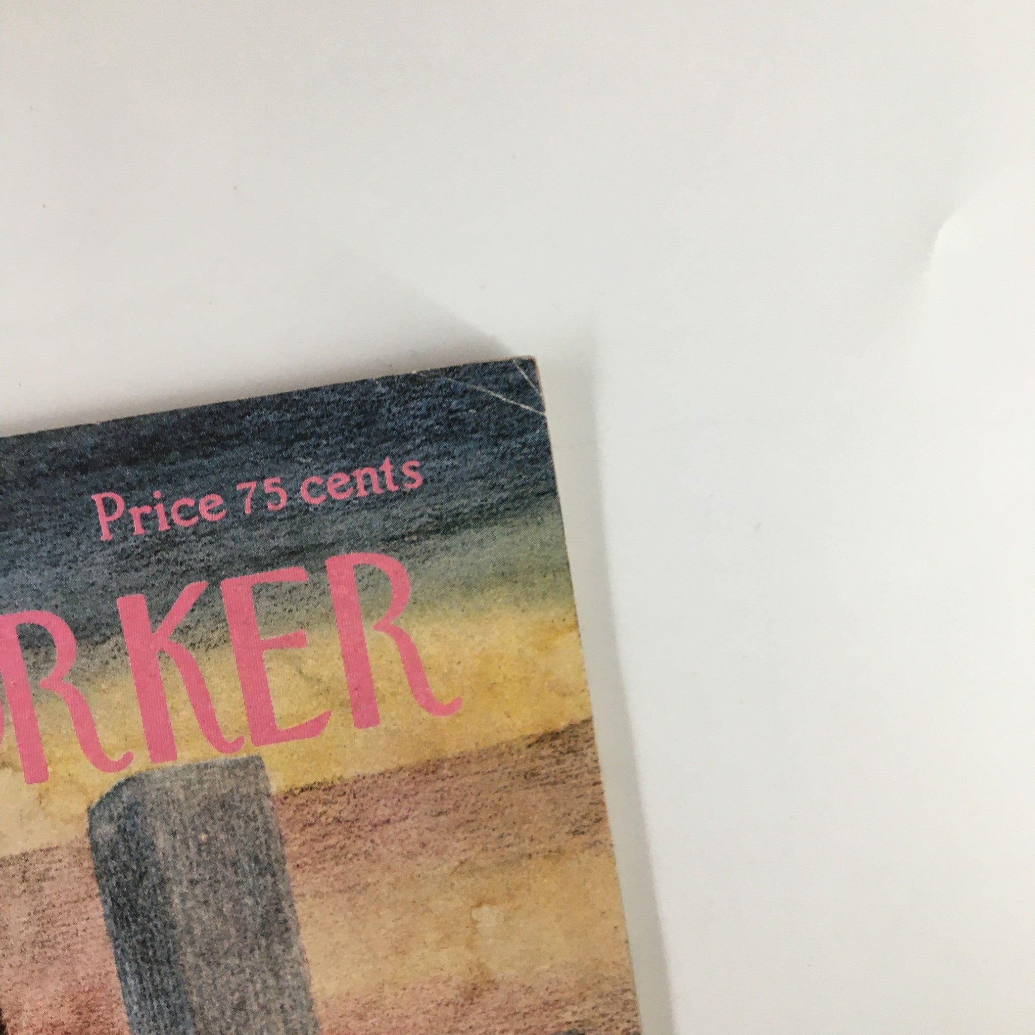 Close-up view of The New Yorker Magazine cover from April 25, 1977, displaying the magazine title and price of 75 cents against a pastel-colored background.
