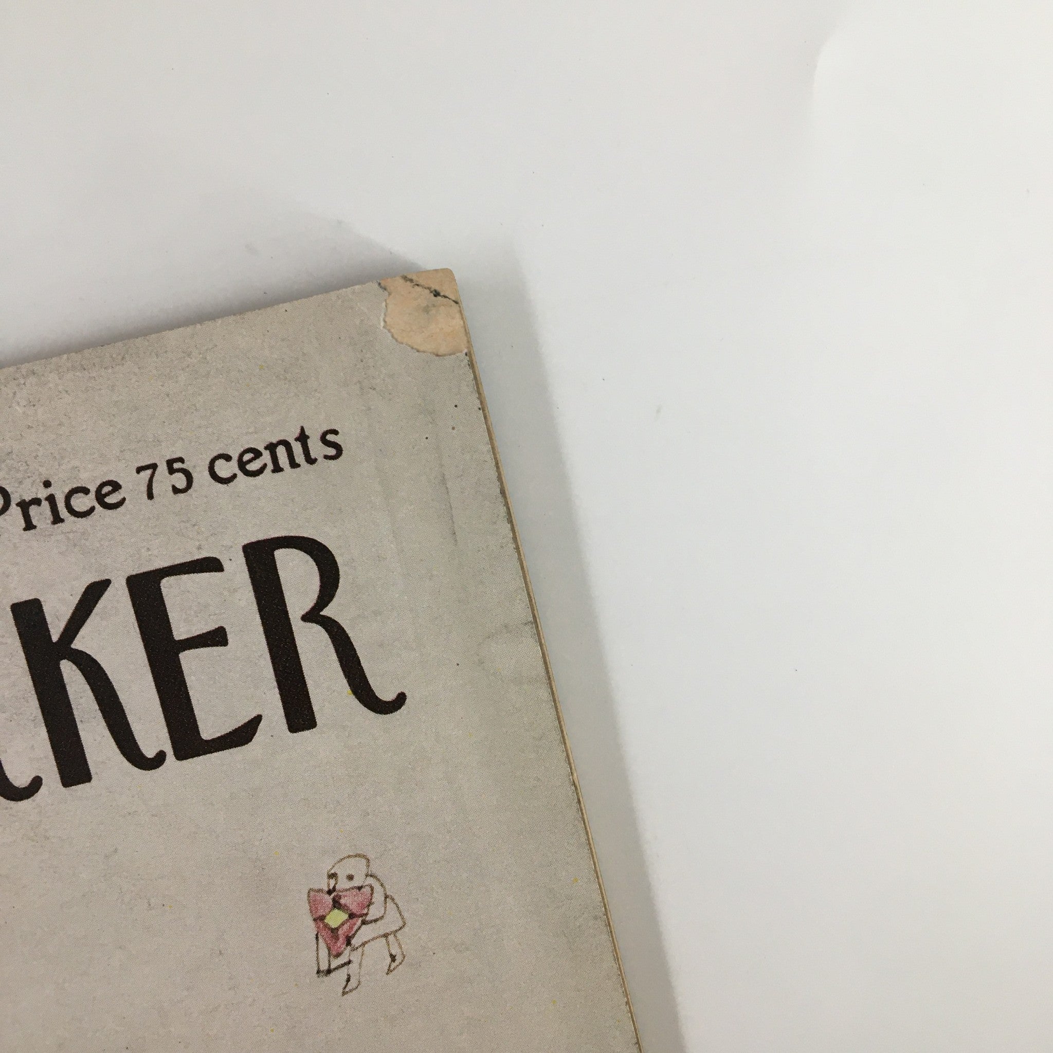 Close-up view of the top right corner of The New Yorker Magazine March 28, 1977, showing the title and a small illustration, emphasizing the magazine's vintage condition.