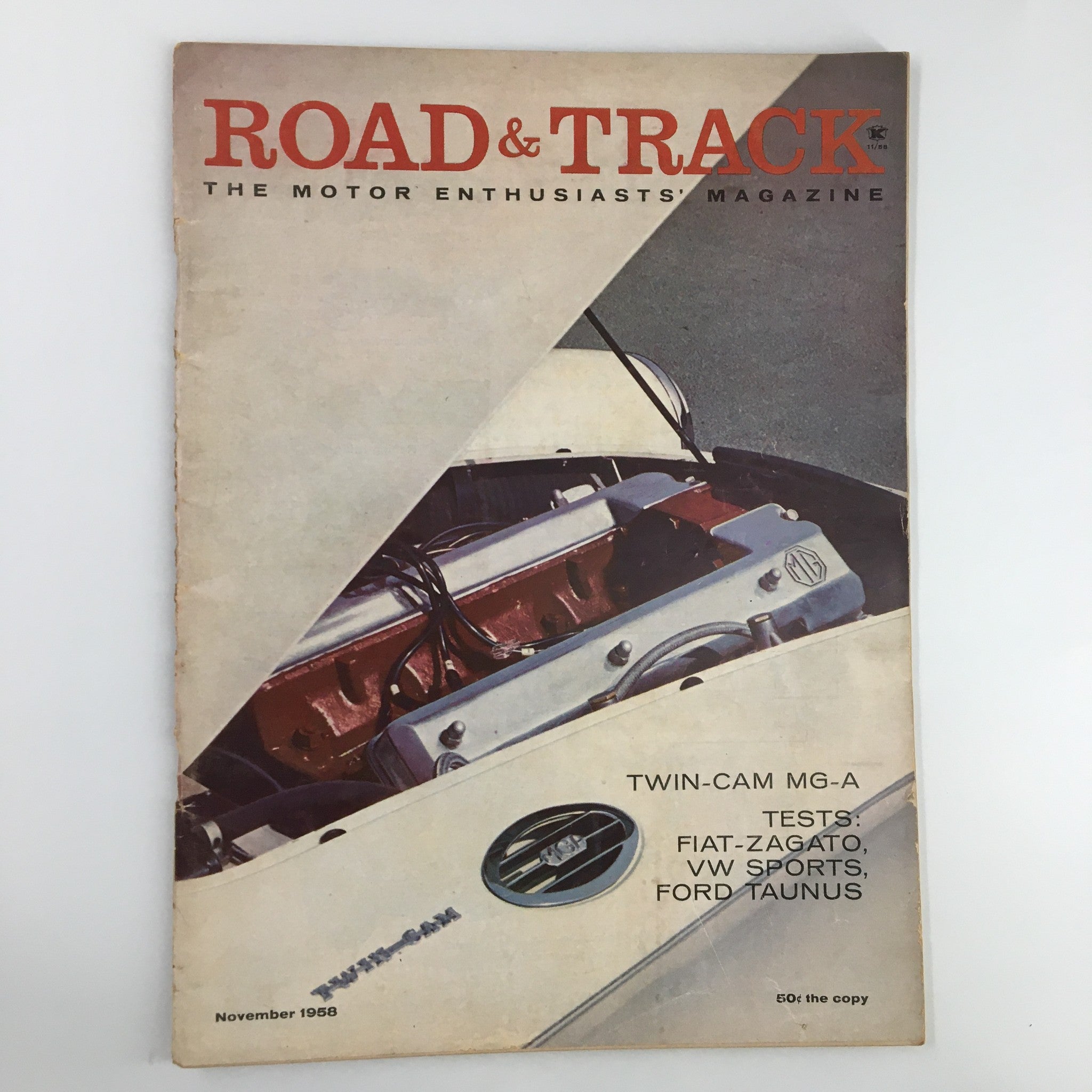 Cover of VTG Road & Track Magazine from November 1958 featuring a double overhead-camshaft engine and the title 'Road & Track The Motor Enthusiasts' Magazine'.