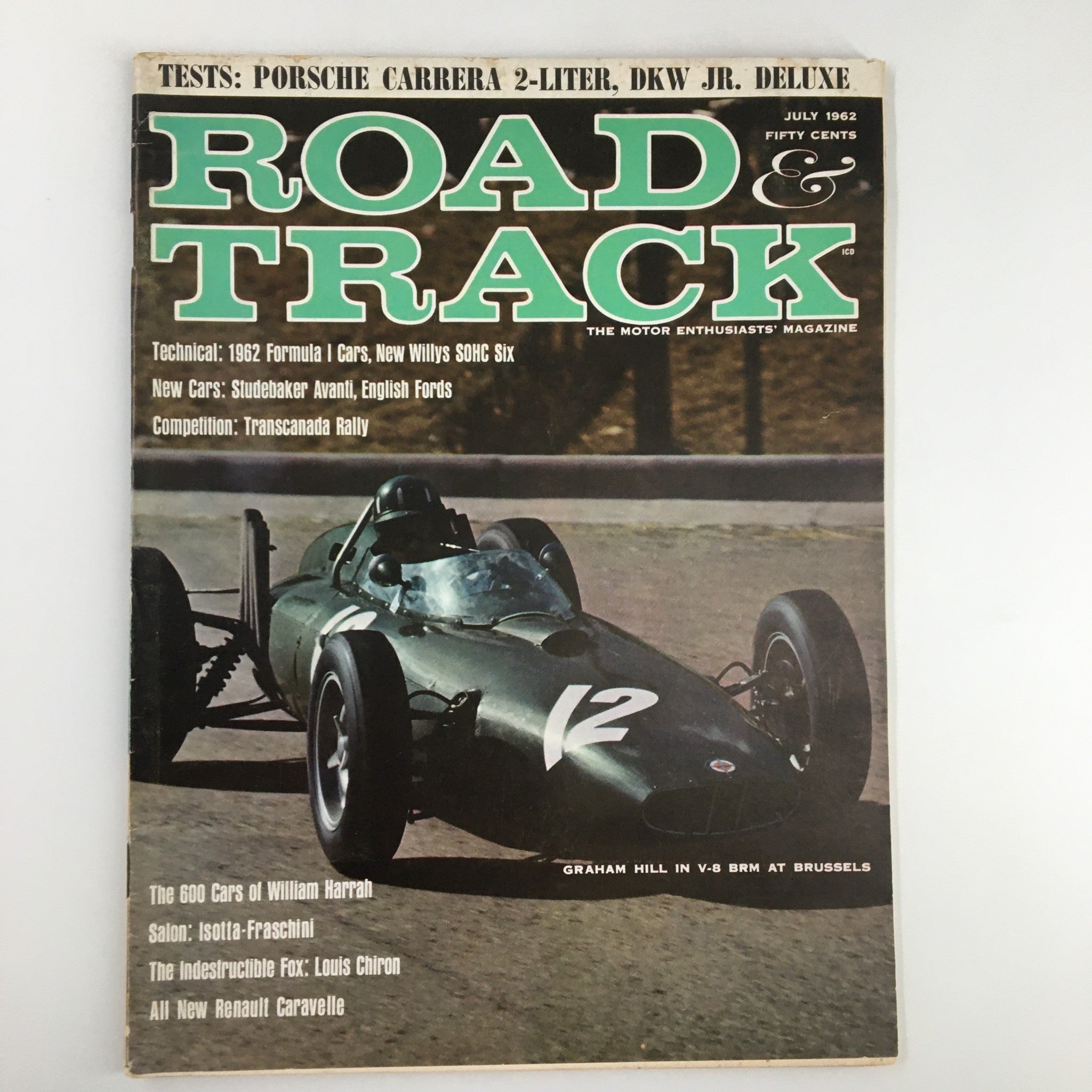 Cover of VTG Road & Track Magazine July 1962 featuring Graham Hill in V-8 BRM at Brussels, showcasing classic car racing from the 1960s.