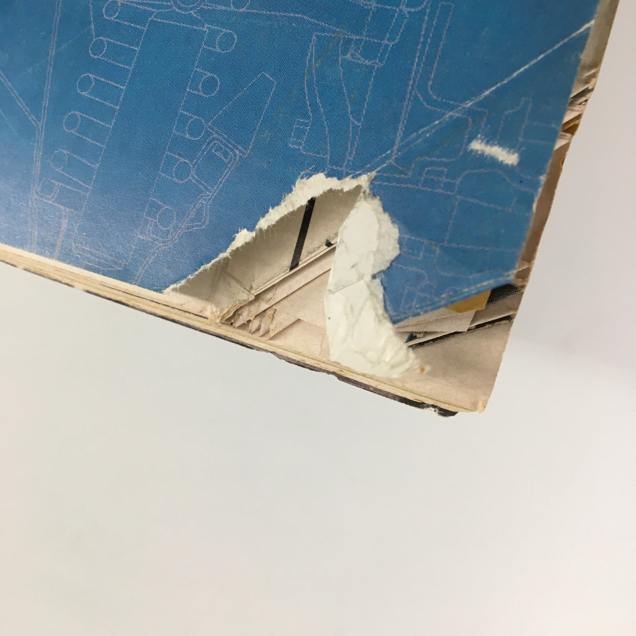 Back cover detail of VTG Road & Track Magazine July 1962 showing a small rip, indicative of its vintage condition while preserving its automotive history.