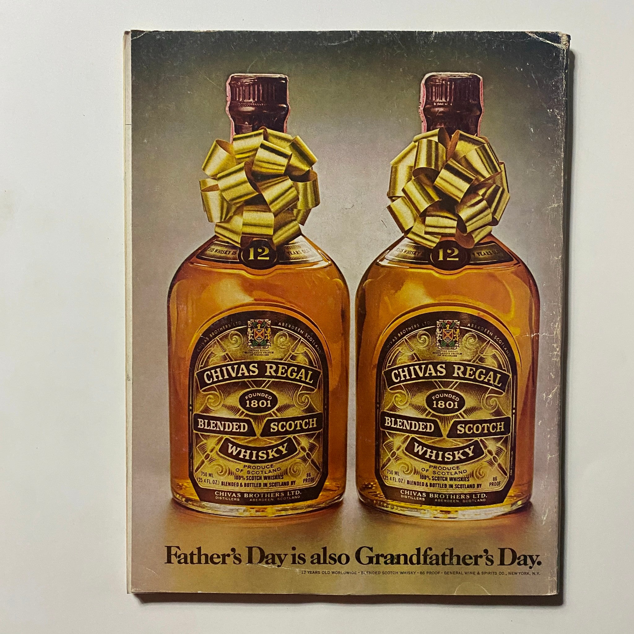 Vintage advertisement featuring Chivas Regal Blended Scotch Whisky bottles adorned with gift bows, promoting the idea that Father's Day is also Grandfather's Day, from the June 1979 issue of Omni Magazine titled 'The Outer Limits of Human Potential.'