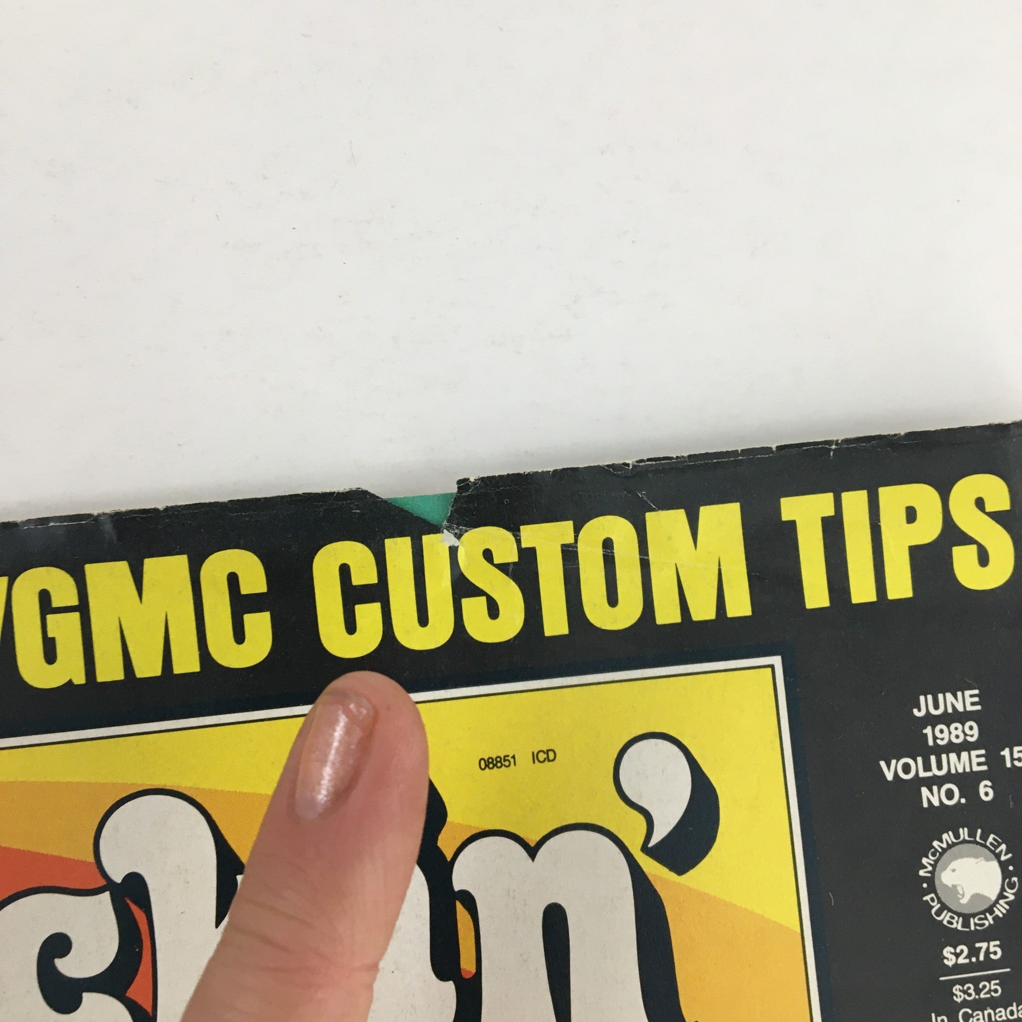 Close-up of Truckin' Magazine June 1989 highlighting details of Chevy/GMC custom tips. Featuring magazine title and minor wear on the cover.