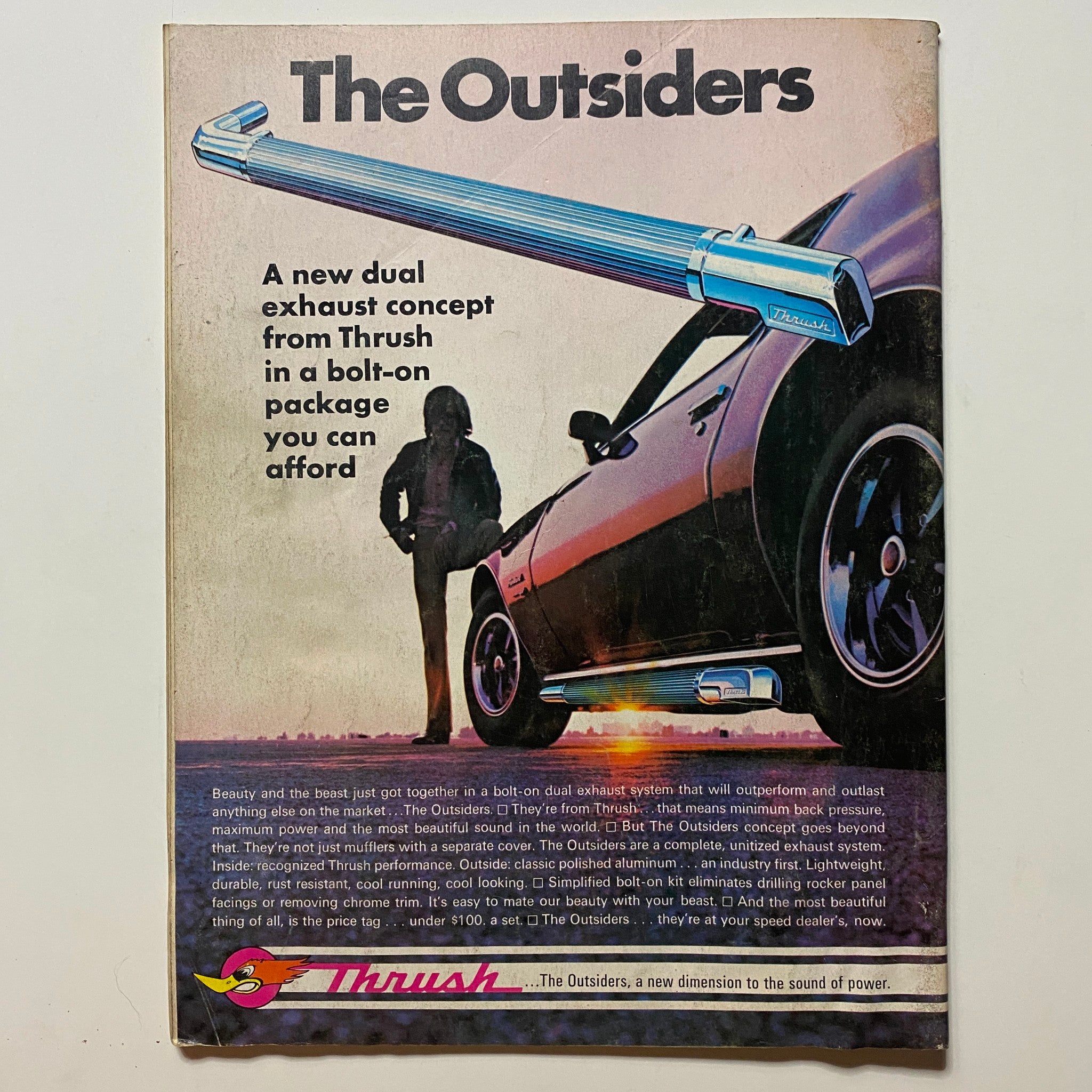 Back cover of Super Stock & Drag Illustrated Magazine October 1971 showcasing an advertisement for a Thrush dual exhaust system, highlighting affordable performance upgrades for cars.