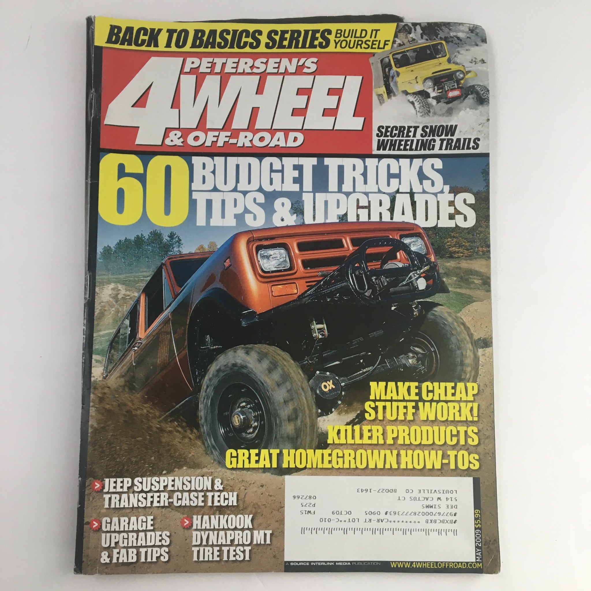 Cover of Petersen's 4 Wheel & Off-Road Magazine May 2009 featuring 60 budget tricks, tips, and upgrades for off-road enthusiasts. The magazine includes advice on make cheap modifications, garage upgrades, and off-road product recommendations.