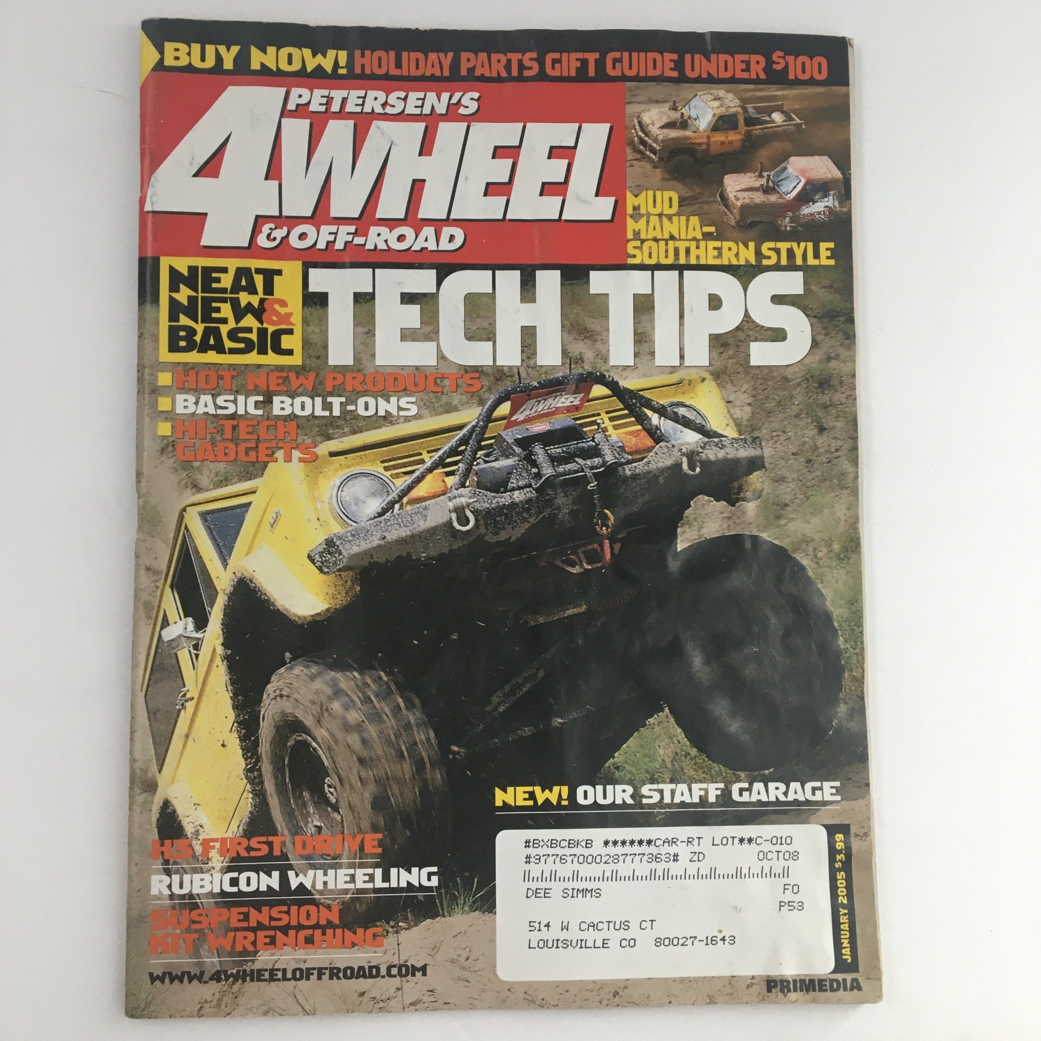 Cover of Petersen's 4 Wheel & Off-Road Magazine January 2005 featuring neat new tech tips and basic boltons for off-road vehicles, showcasing a rugged off-road truck in action.