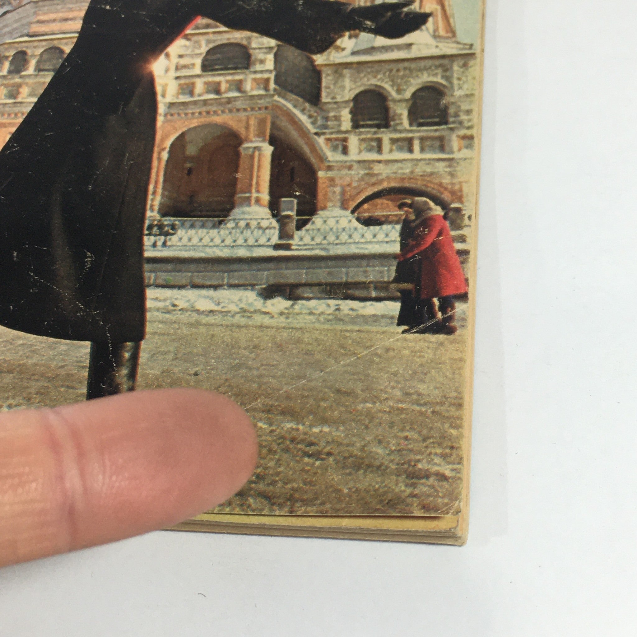 Close-up of the VTG TV Guide Magazines June 26-July 2 1976 Vol 24 #26, showcasing the magazine cover detail with a woman's hand pointed towards the image of a woman in Red Square, Moscow.