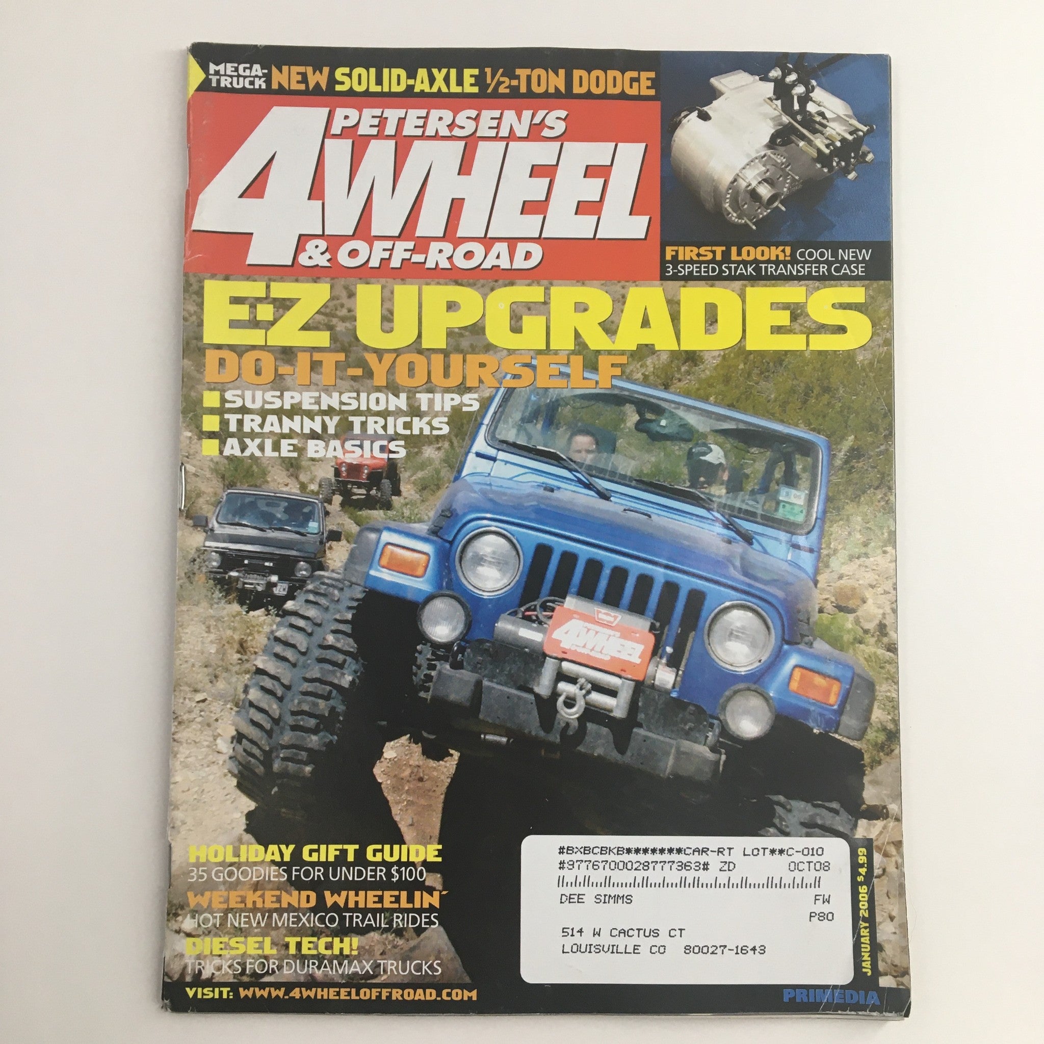 Cover of Petersen's 4 Wheel & Off-Road Magazine January 2006 featuring DIY suspension upgrades and off-road tips. Highlighting off-road vehicle customization and upgrades, the magazine cover showcases a blue Jeep in action on rugged terrain.
