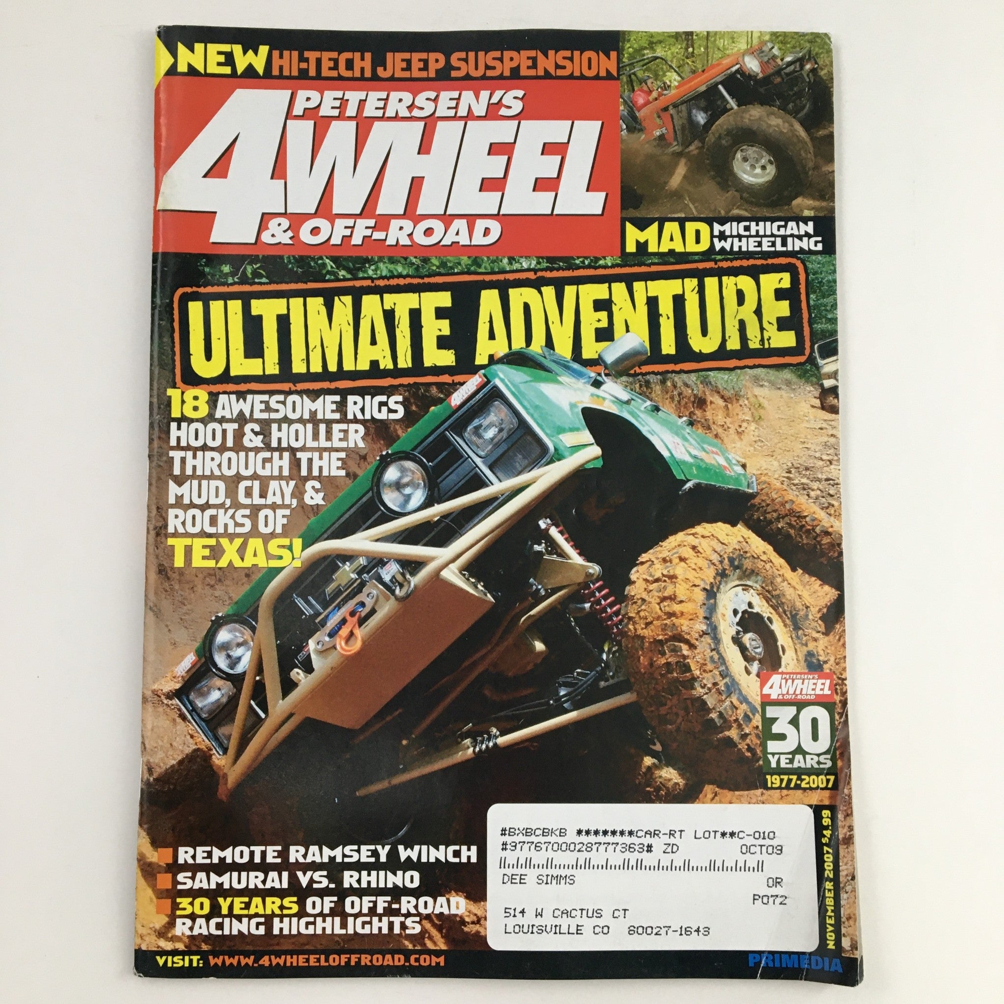 Cover of Petersen's 4 Wheel & Off-Road Magazine November 2007 featuring Mad Michigan Wheeling, showcasing a rugged off-road vehicle navigating through challenging terrain with an emphasis on high-tech Jeep suspension.