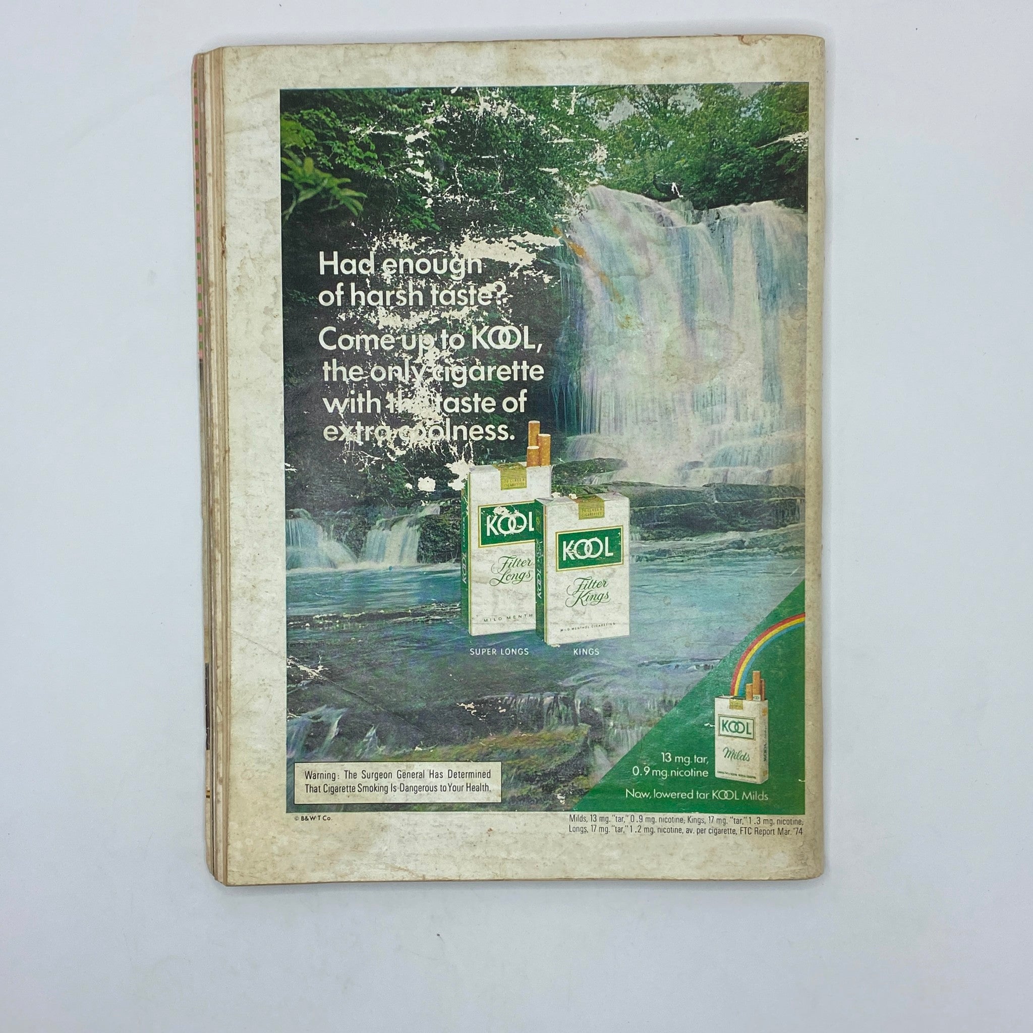 Back cover of VTG Playboy Magazine January 1975 featuring an advertisement for KOOL cigarettes, adorned with scenic imagery and vintage branding.