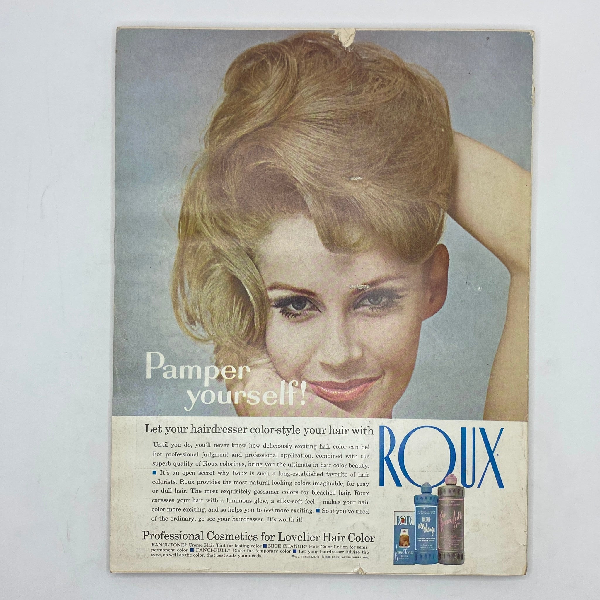 Vintage Vogue Magazine October 1 1962 advertisement for Roux hair color products, emphasizing hair styling and beauty tips.