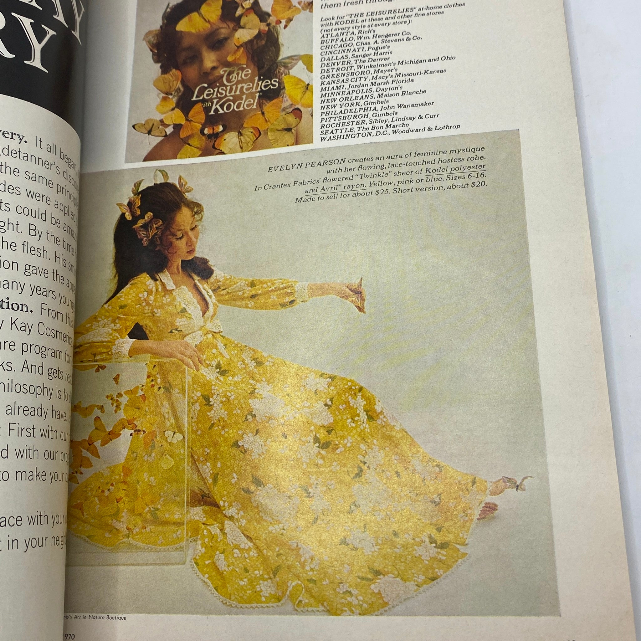 Inside page of VTG Vogue Magazine March 1 1970 showcasing a model wearing a flowing floral robe made of Kodel fabric surrounded by decorative autumn leaves.