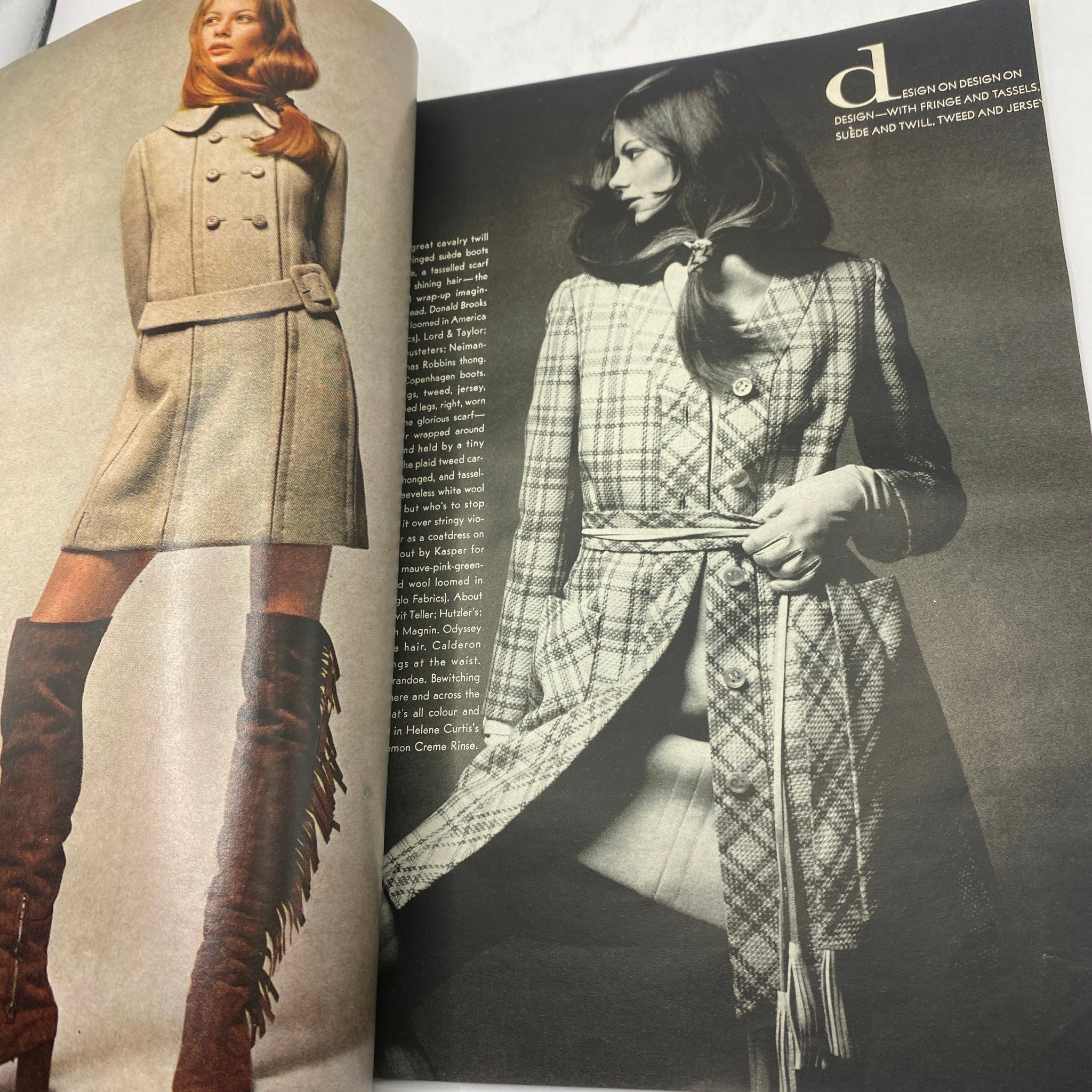 Fashion editorial from VTG Vogue Magazine January 15, 1970 showcasing models in stylish outfits, including a coat and knee-high boots.
