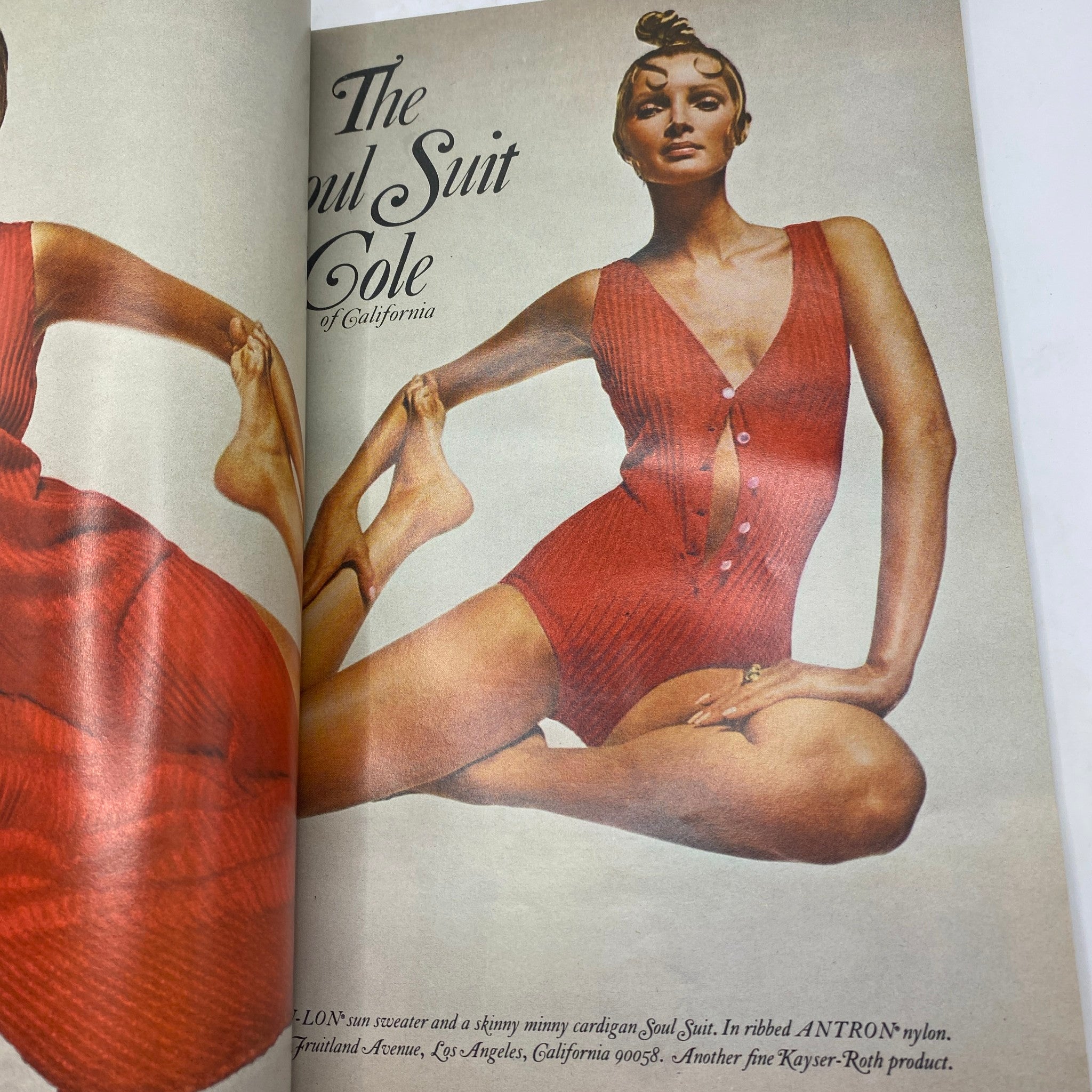 Fashion spread from VTG Vogue Magazine January 15, 1970 featuring models in a red Soul Suit and stylish swimwear, showcasing 1970s fashion trends.