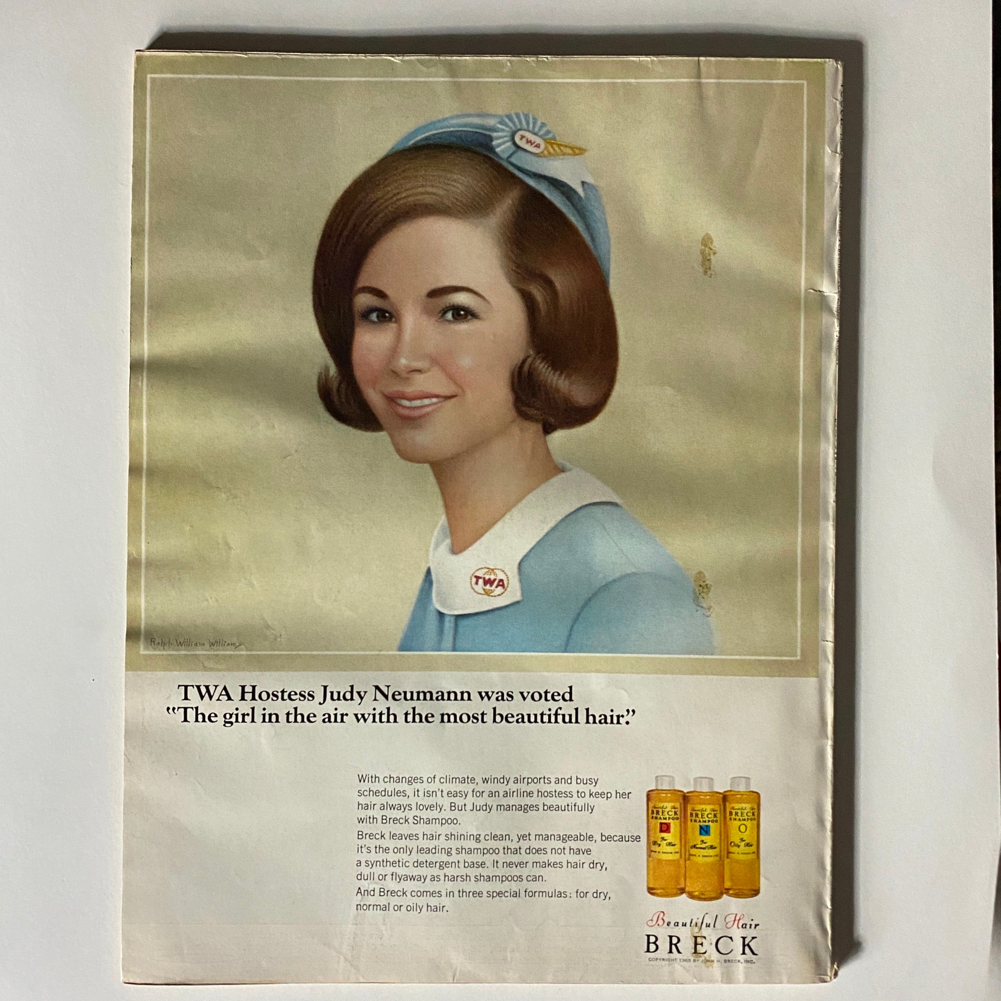 Vintage advertisement from VTG Vogue Magazine January 15, 1966 depicting TWA Hostess Judy Neumann promoting Breck Shampoo.