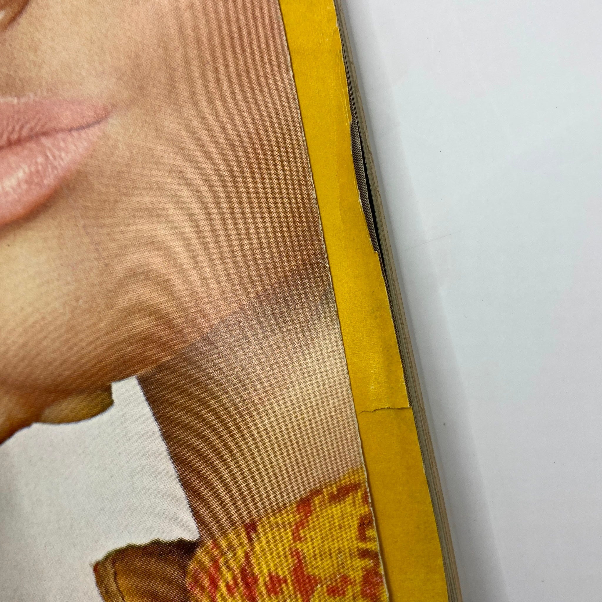 Detail of a model's portrait in VTG Vogue Magazine February 15 1966, highlighting the vintage styling and artistic photography from the 1960s.