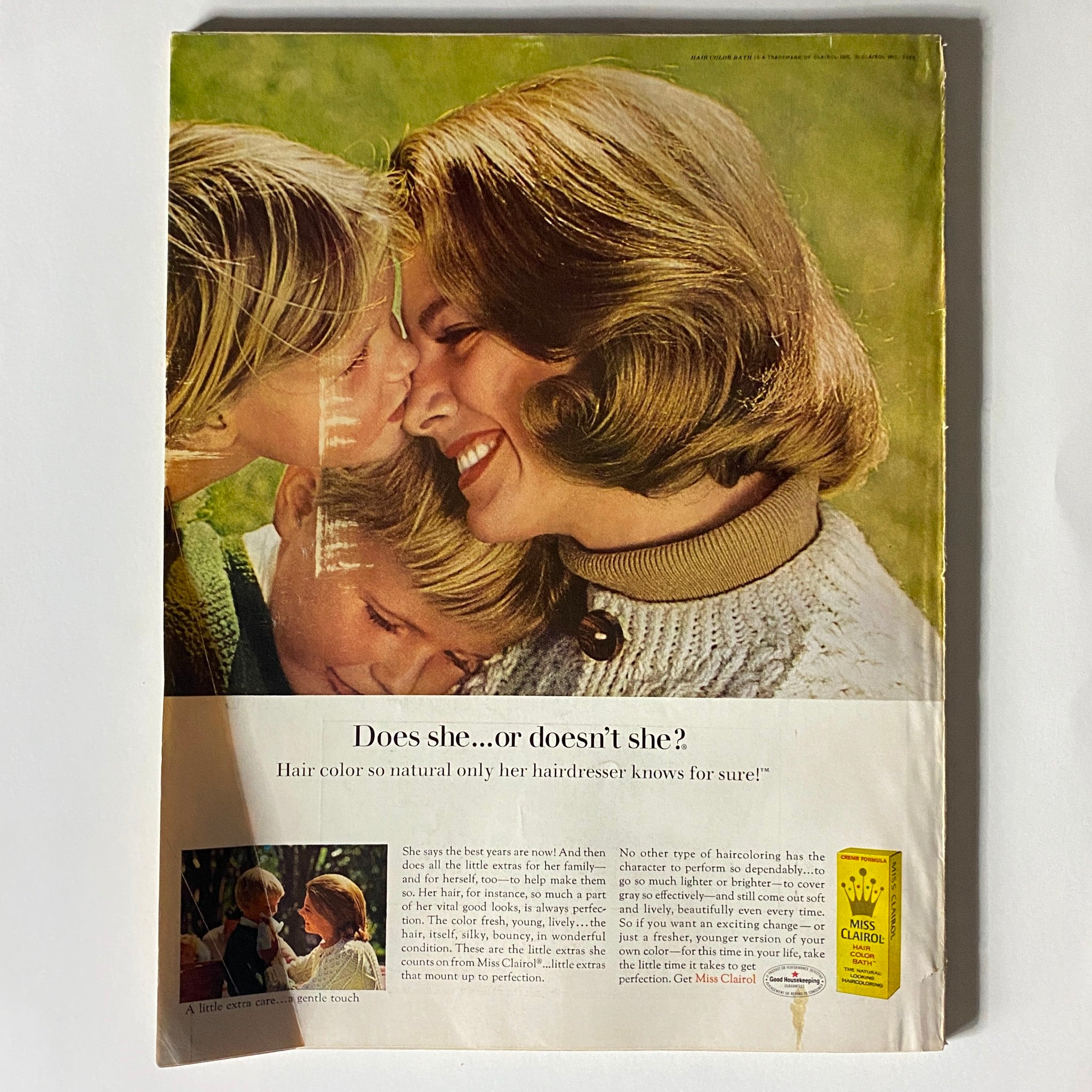Vintage Vogue Magazine February 15 1966 back cover featuring a mother and children in a playful moment highlighting hair color advertisement.