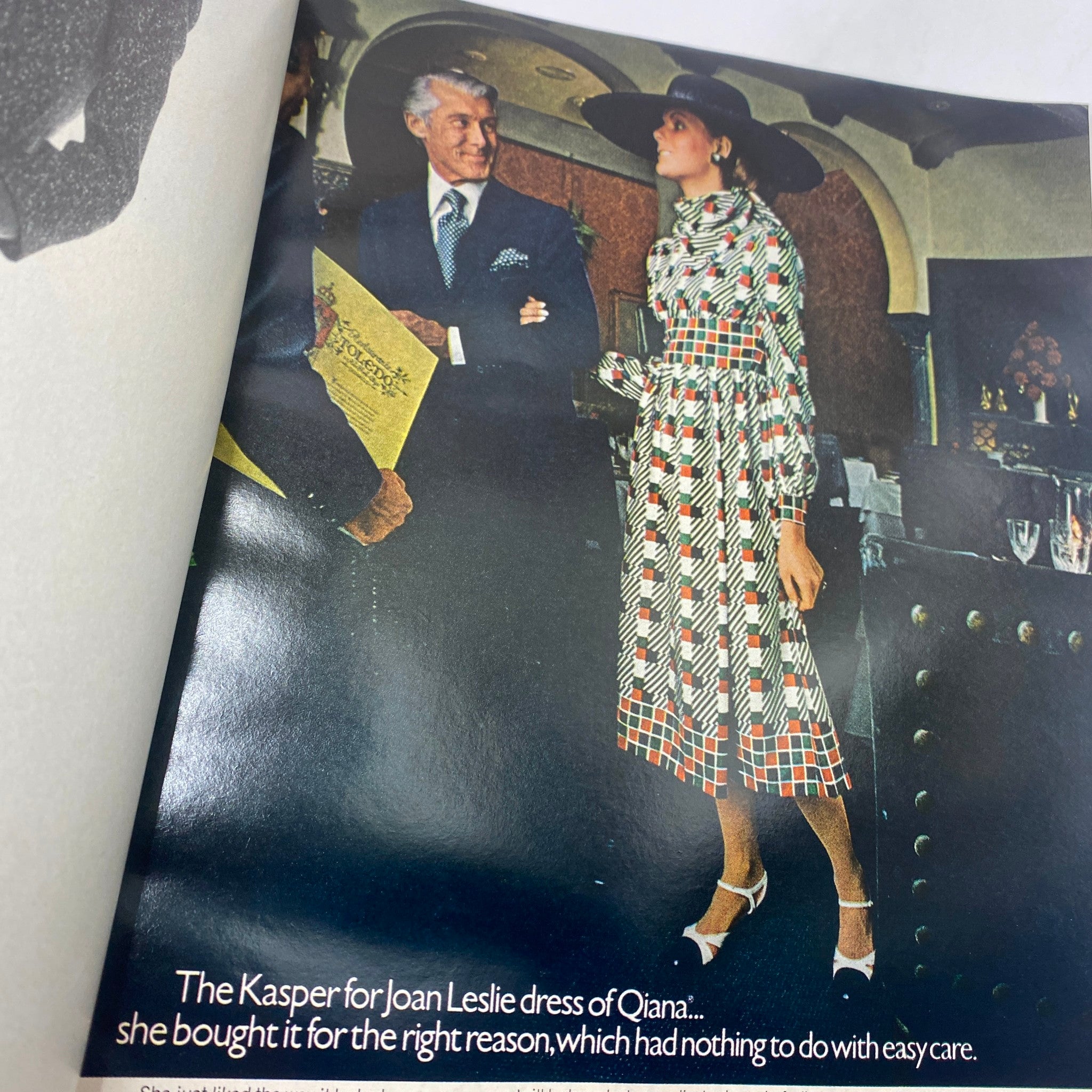 Fashion spread in VTG Vogue Magazine February 1 1971, highlighting a model in a chic patterned dress with elegant accessories.