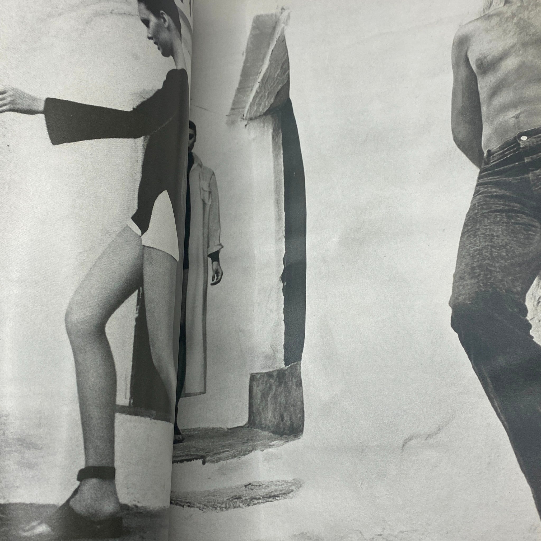 Artistic black and white photograph in VTG Vogue Magazine December 1971 displaying a model in a stylish outfit, emphasizing fashion trends from the early 1970s.