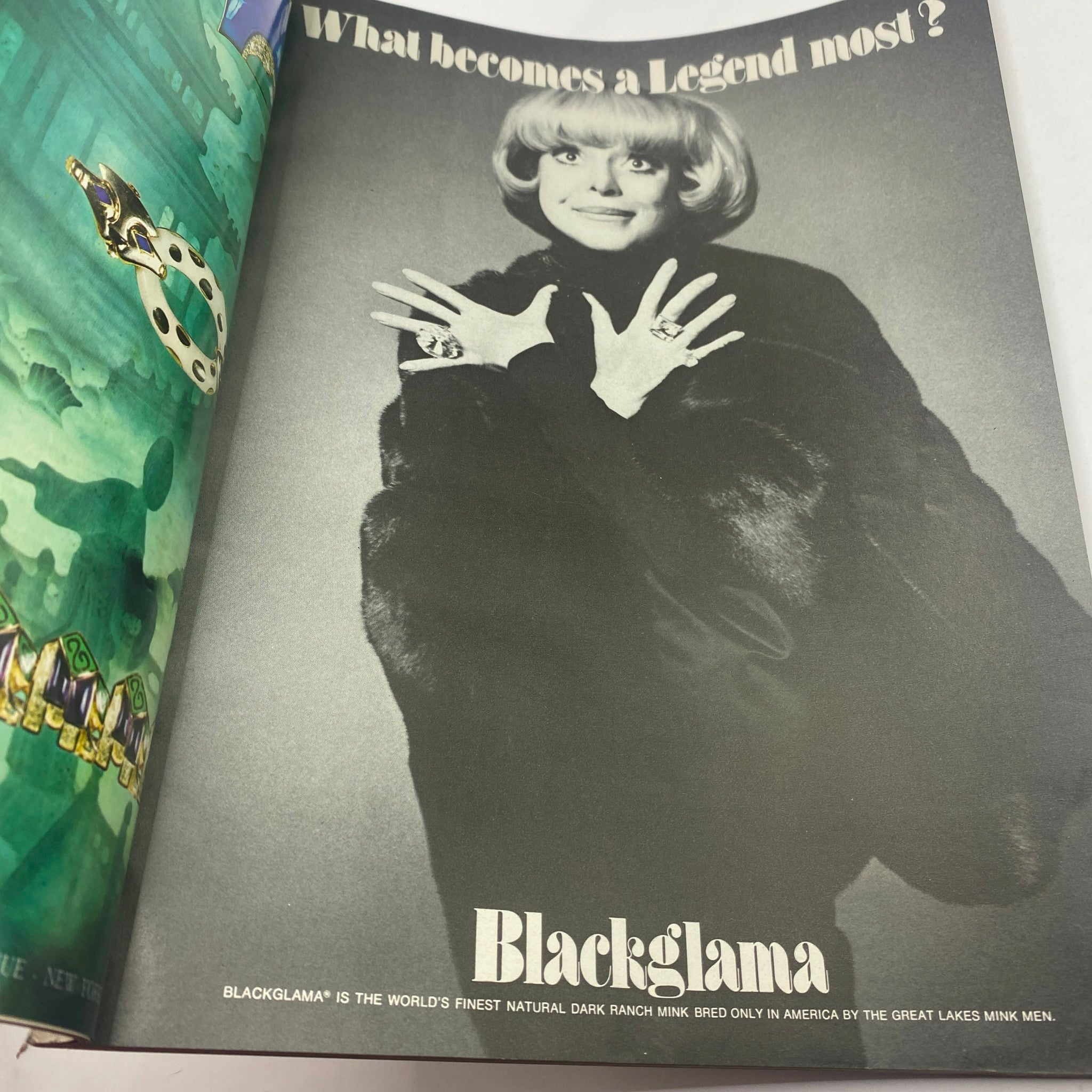 Vintage ad from the VTG Vogue Magazine September 1973, showcasing a fashion model wearing luxurious jewelry and fur coat, highlighting 70s glamour and style.