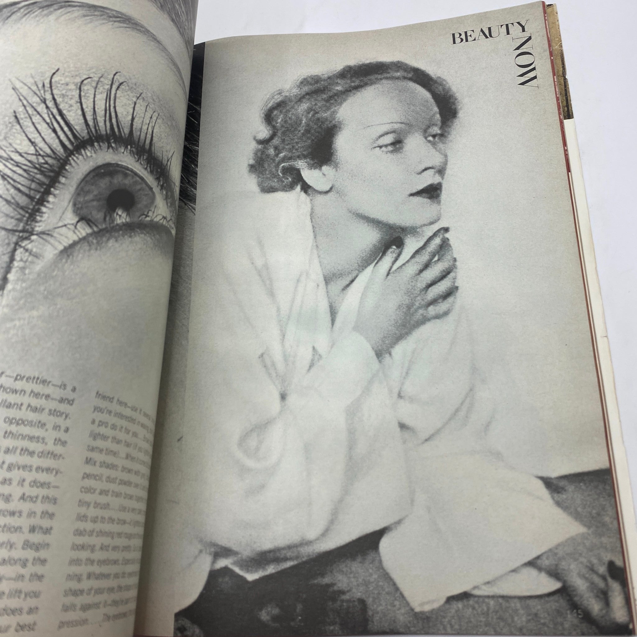 Beauty feature in VTG Vogue Magazine February 1973 depicting a chic model showcasing beauty products and trends.