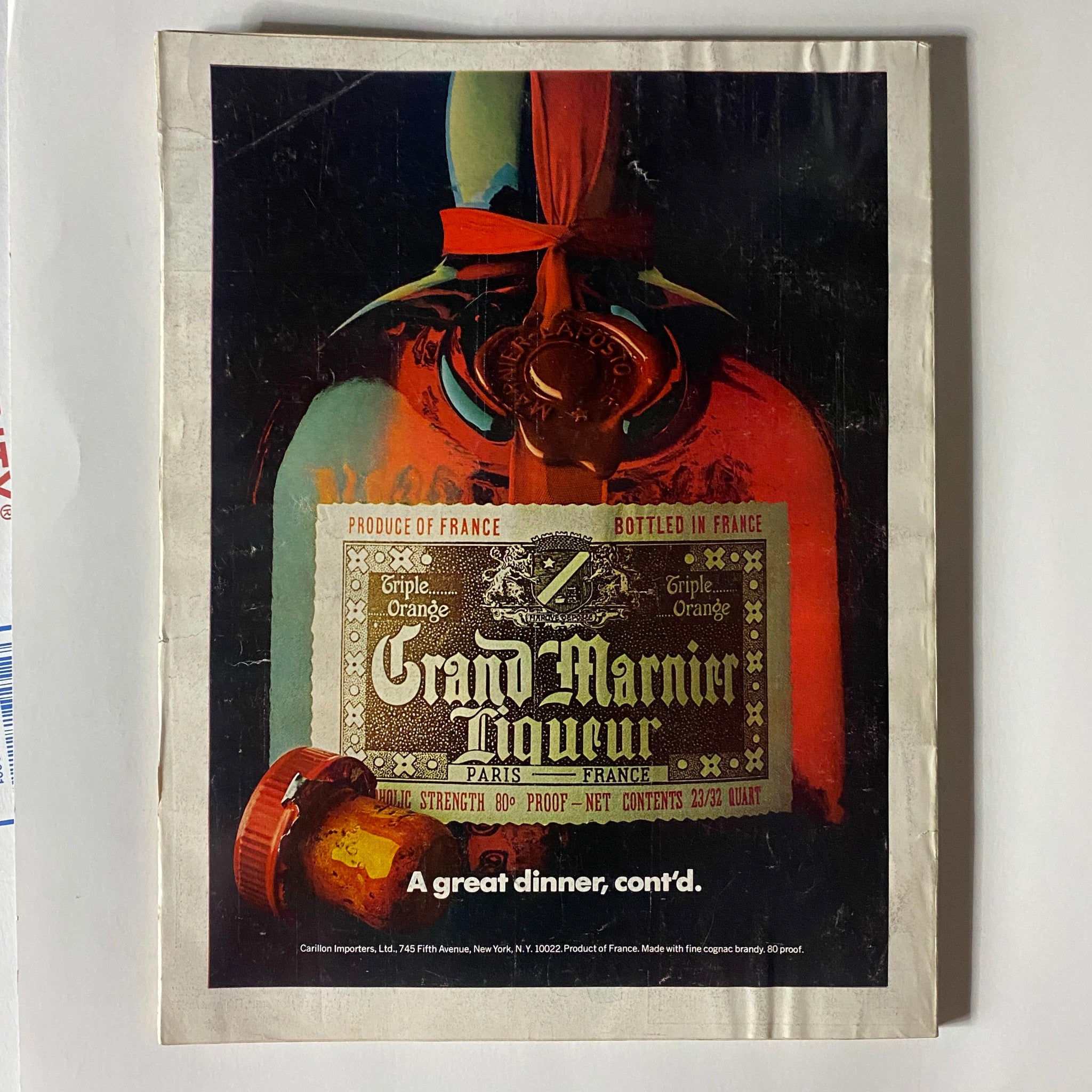 Back cover of VTG Vogue Magazine February 1973 displaying an artistic advertisement for Grand Marnier liqueur.