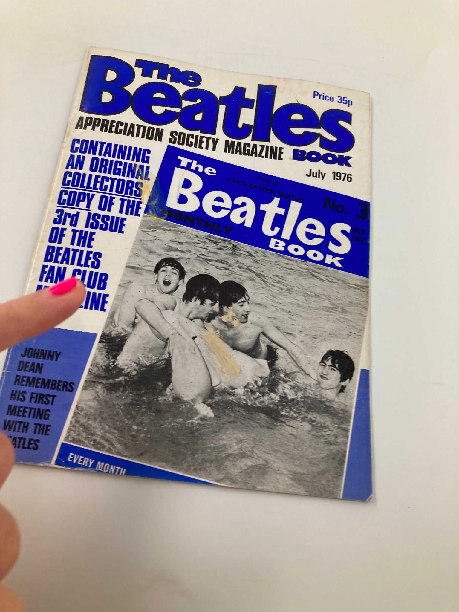 The Beatles Book Monthly Magazine July 1976 No. 3 A Tale of Four Beatles, showcasing a close-up view of the cover with band members swimming, emphasizing its collectible status and historical significance in music culture.