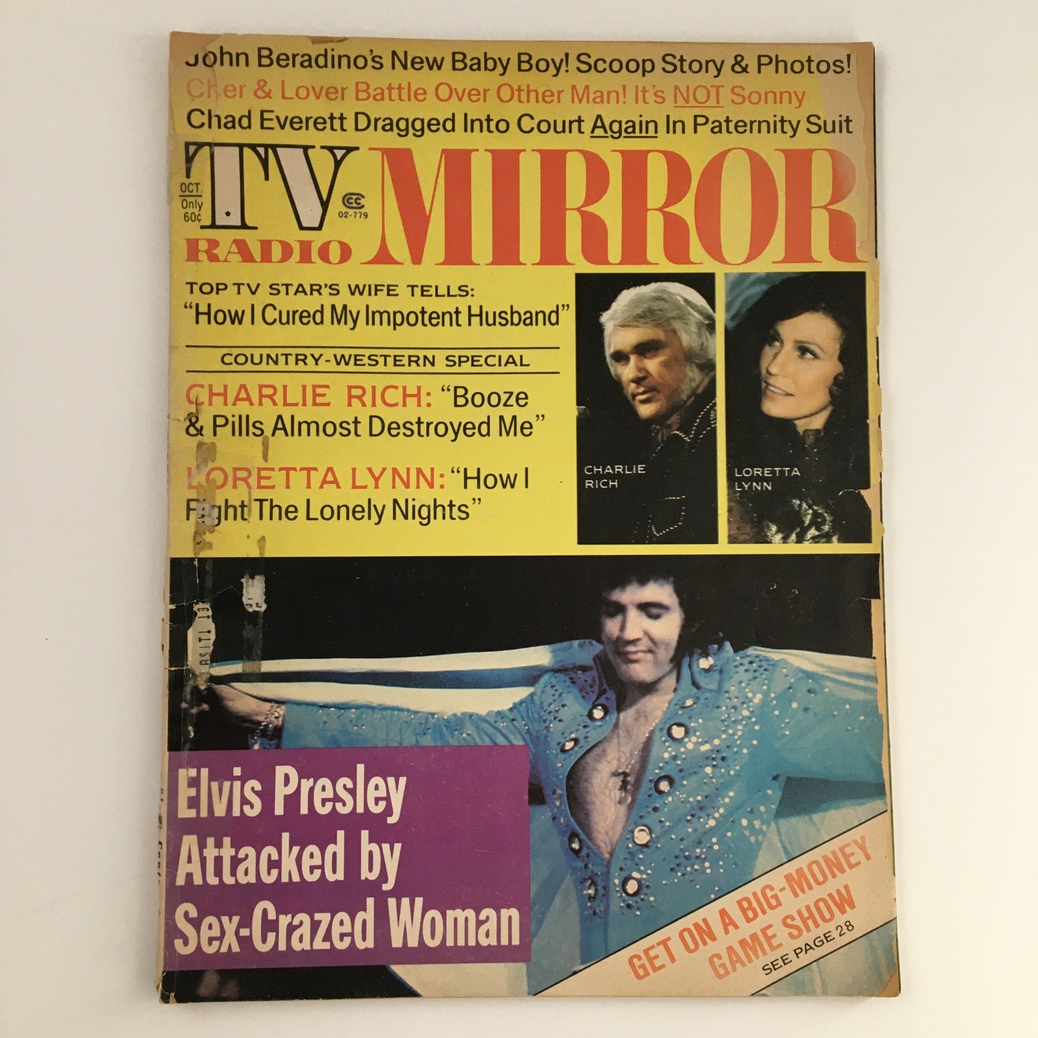 Cover of TV Radio Mirror Magazine from October 1974 featuring Elvis Presley and Charlie Rich, with headlines about Loretta Lynn and celebrity news.