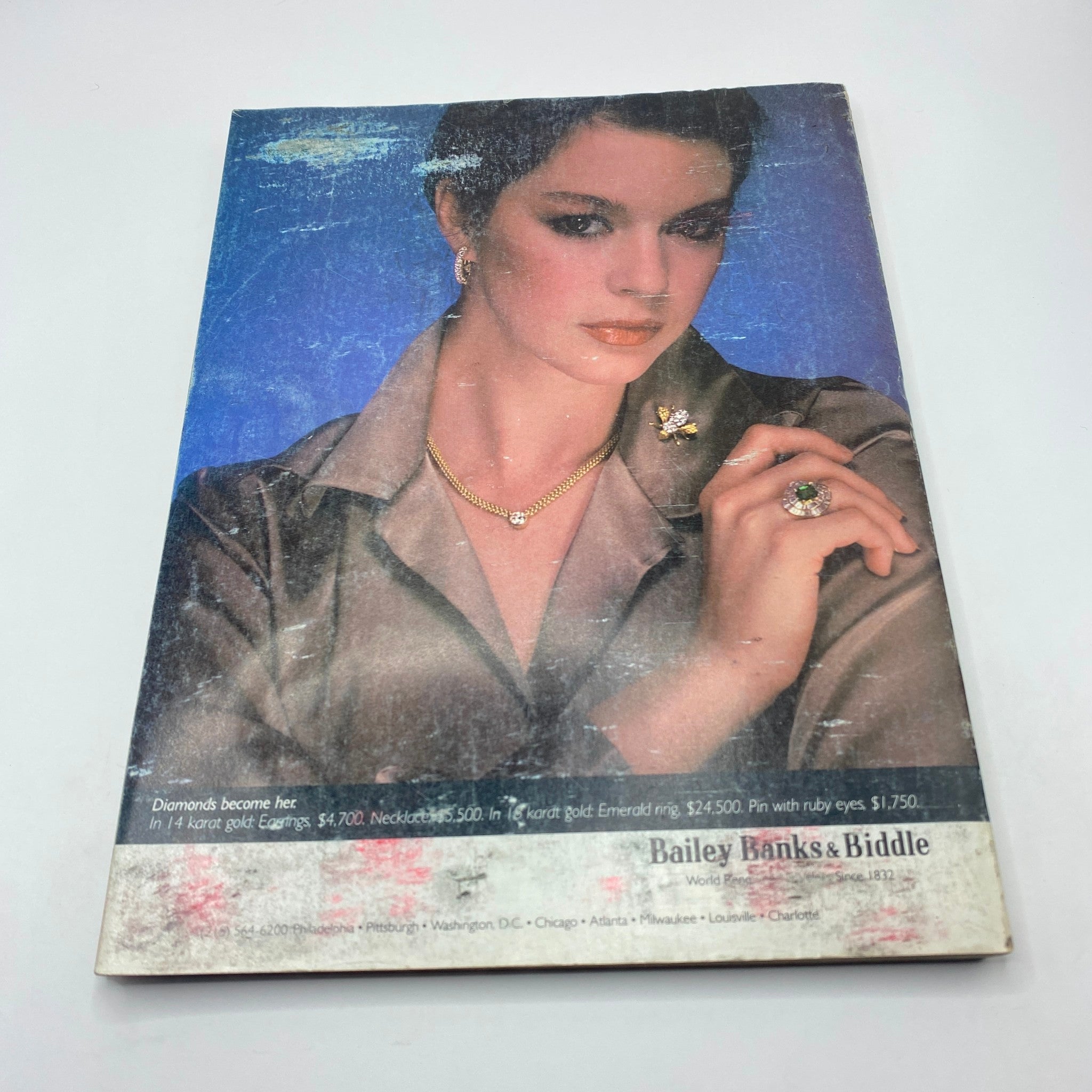 Back cover of VTG Vogue Magazine April 1980 with an advertisement for Bailey Banks & Biddle featuring elegant jewelry.