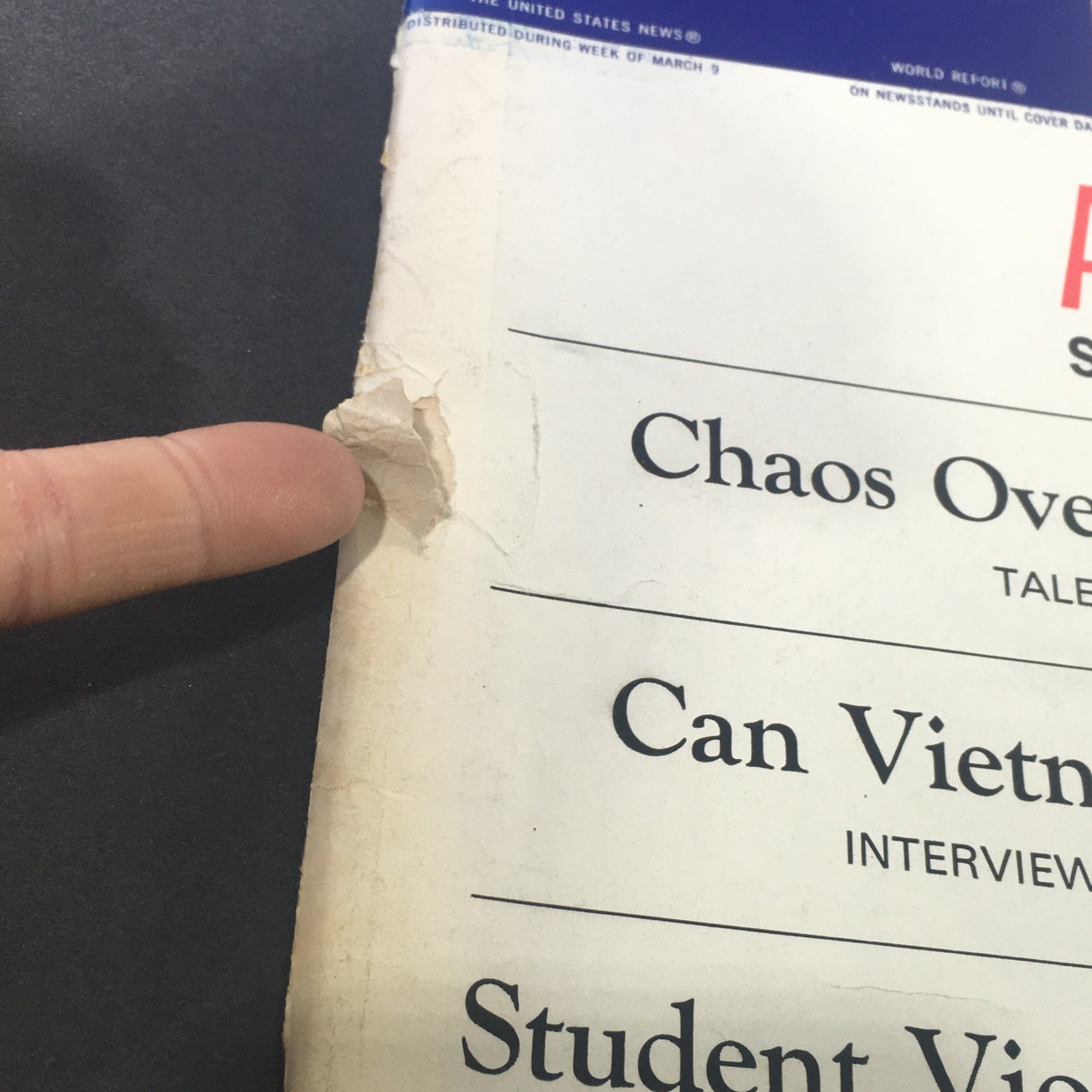 Close-up of damage on the cover of VTG U.S. News & World Report Magazine March 16 1970, highlighting a tear near the top.