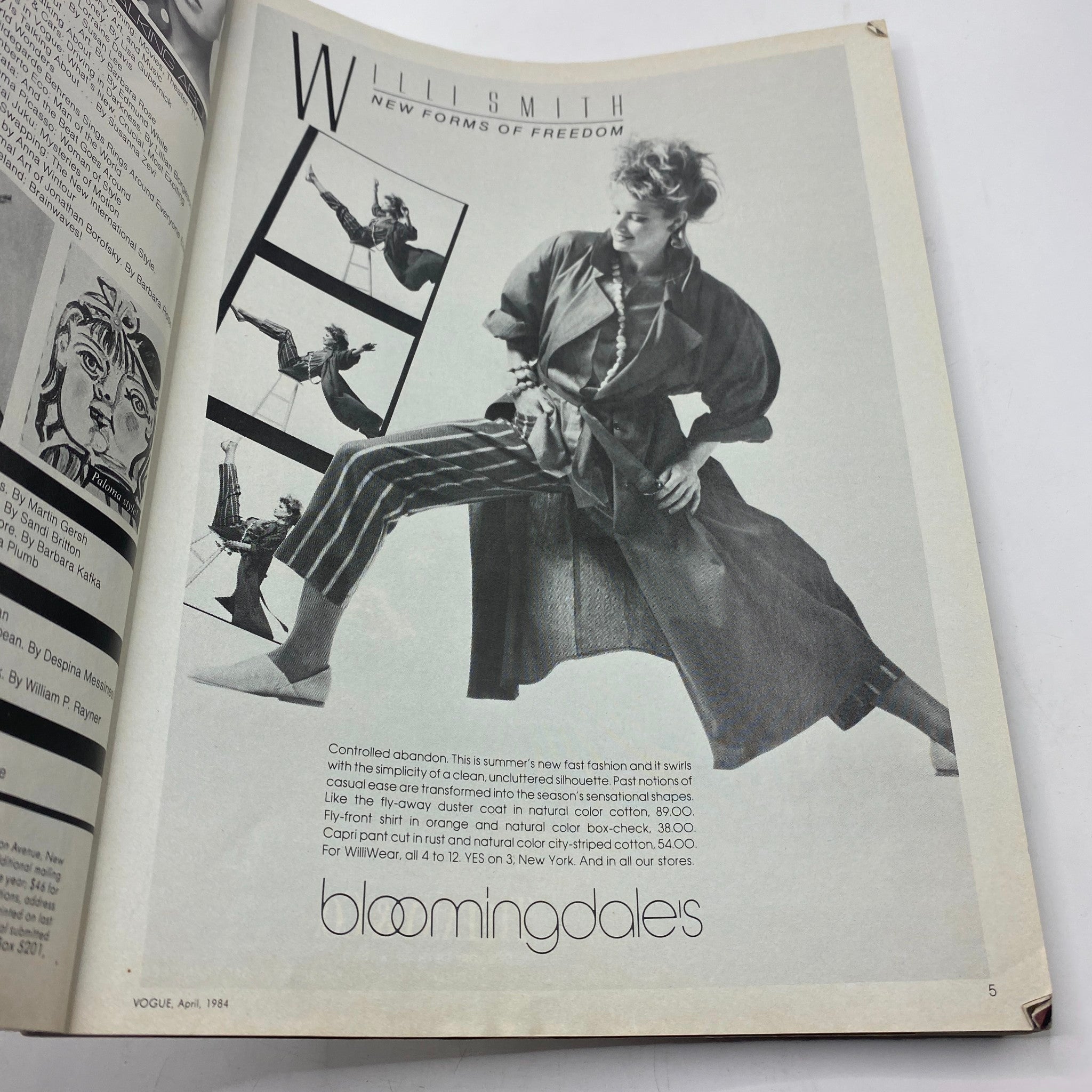 Another inside page of VTG Vogue Magazine April 1984 showcasing fashion photography by Willi Smith, featuring striking poses and lively designs.