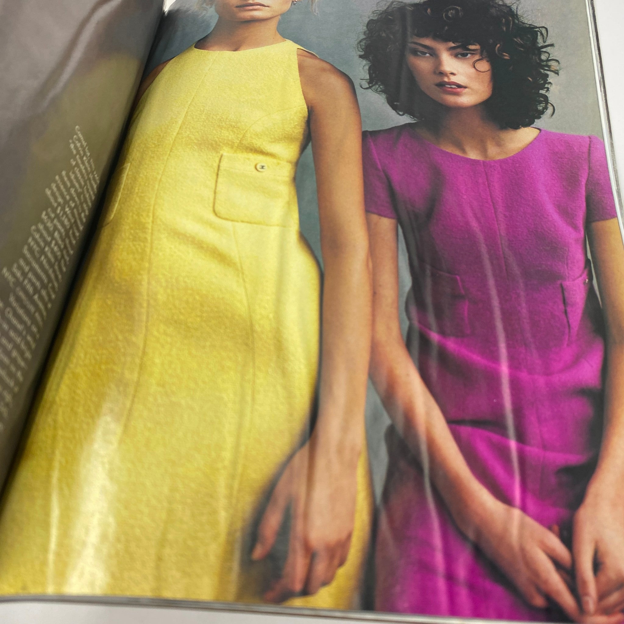 Vogue Magazine January 1996 Amber Valletta by Steven Meisel GD Interior No Label - An editorial photograph featuring models in bright yellow and pink dresses, reflecting 90s fashion aesthetics.