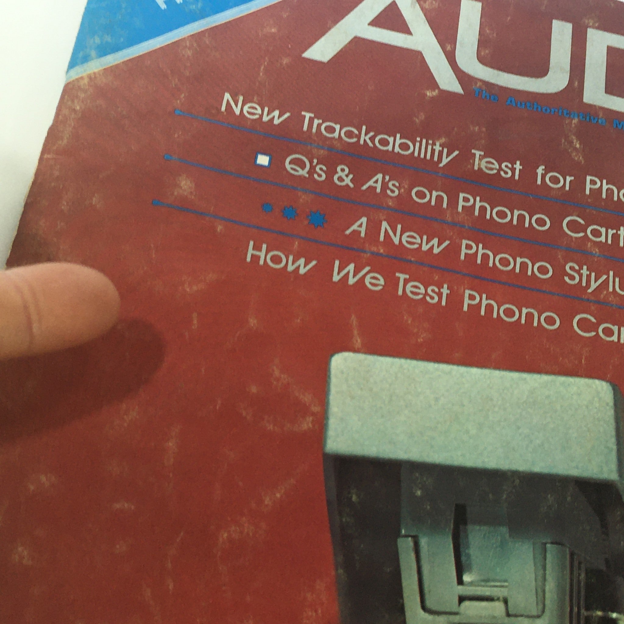 Close-up view of the cover of VTG Audio and Music Magazine August 1972, highlighting details such as the articles on phono cartridges and trackability tests. The magazine bears a complimentary copy label.