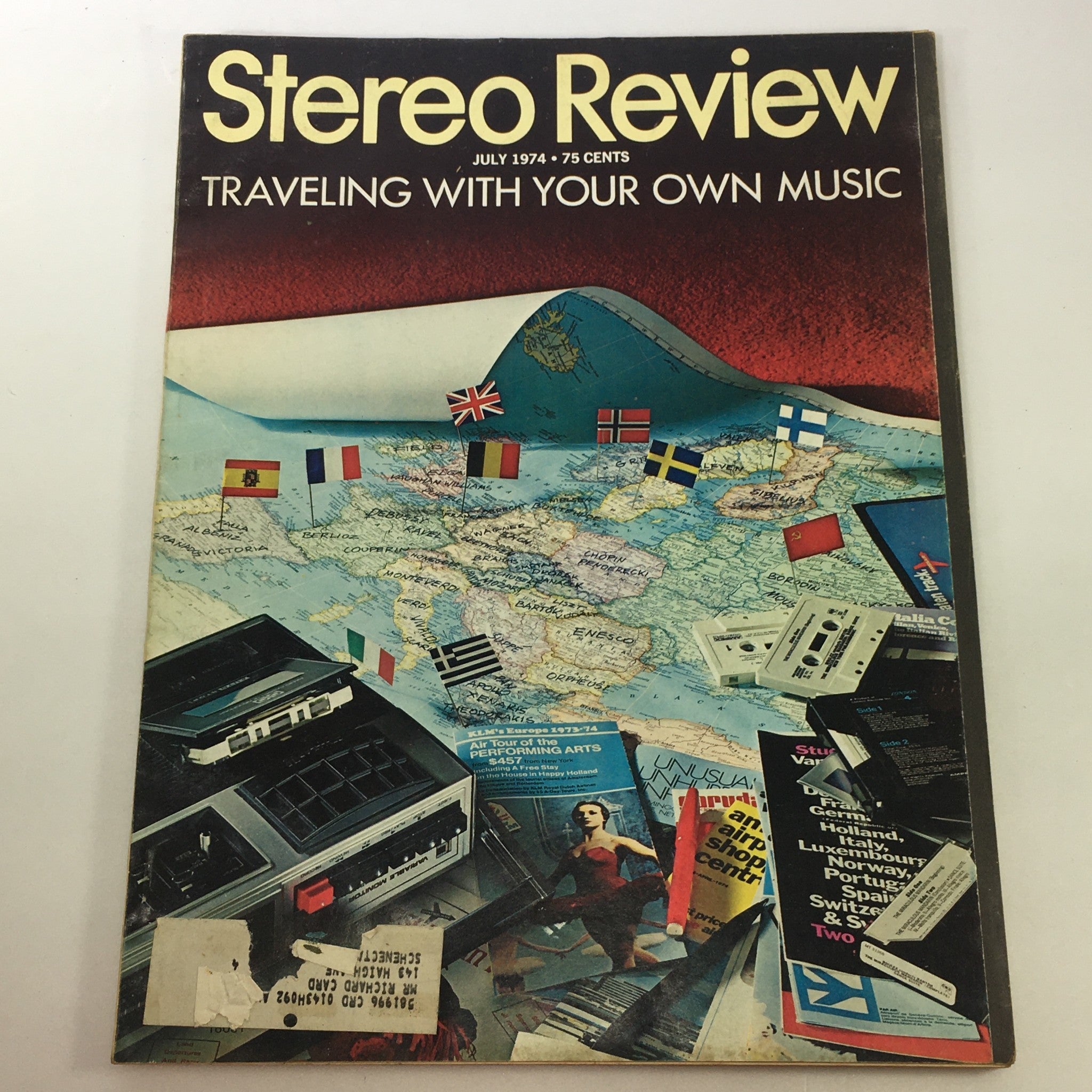Cover of VTG Stereo Review Music Magazine July 1974 featuring the title 'Traveling With Your Own Music' with an artistic illustration of a world map and travel-related imagery.