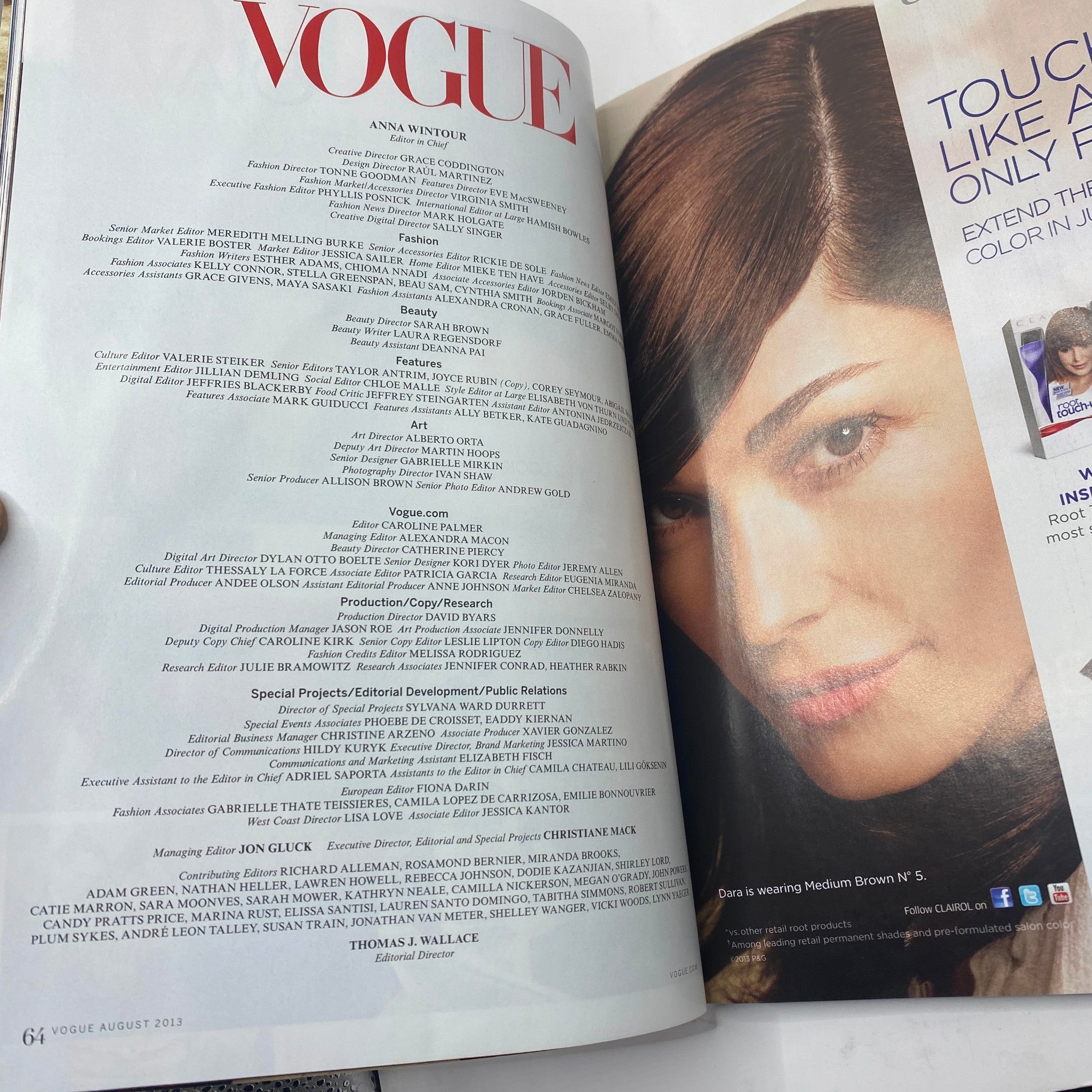 Page from Vogue Magazine August 2013 featuring the editorial team credits and a close-up image of a model's face.