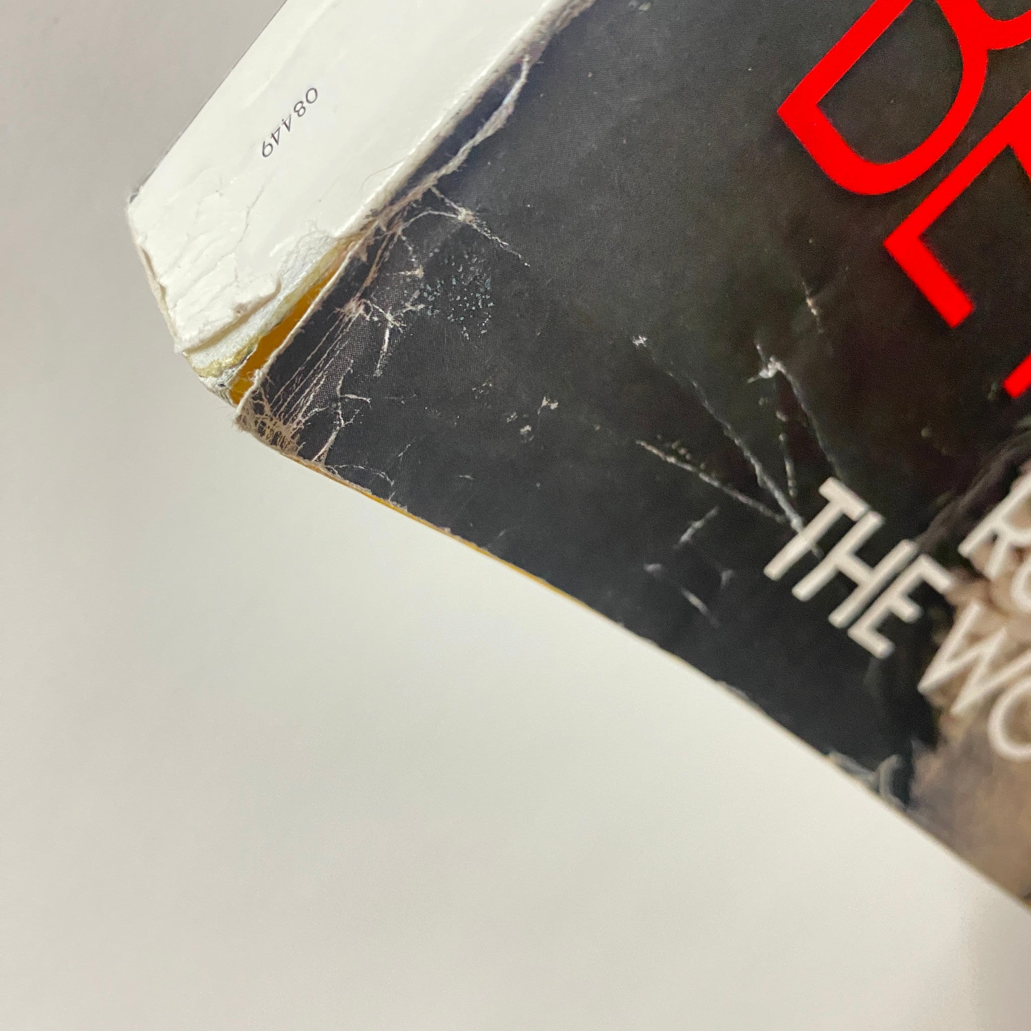 Detail of the spine of Vogue Magazine March 2013, showing wear and the title 'Beyonce Rules the World'.