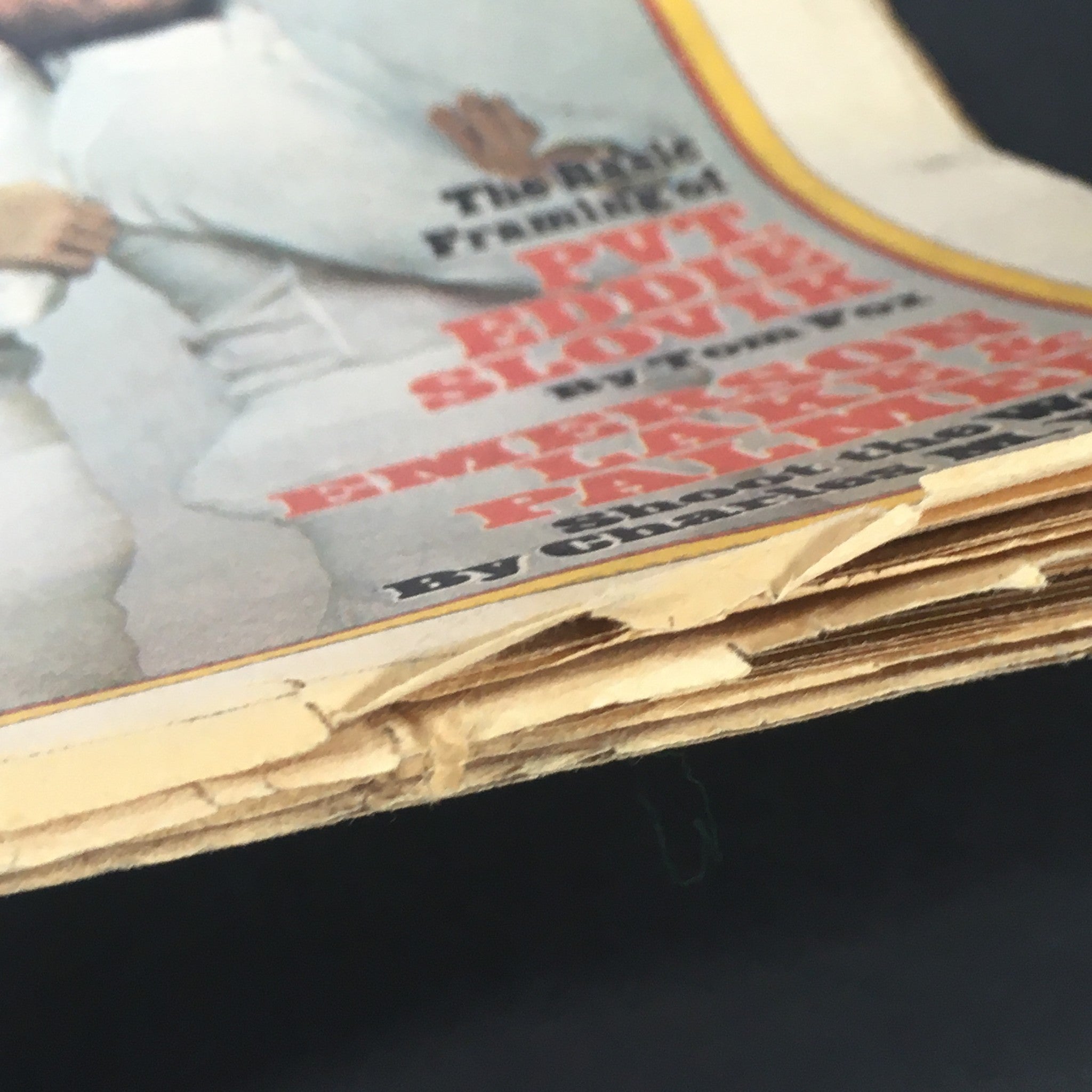 Close-up of the VTG Rolling Stone Magazine July 14 1977 spine, highlighting the vintage wear and authenticity of the publication featuring the Bee Gees.