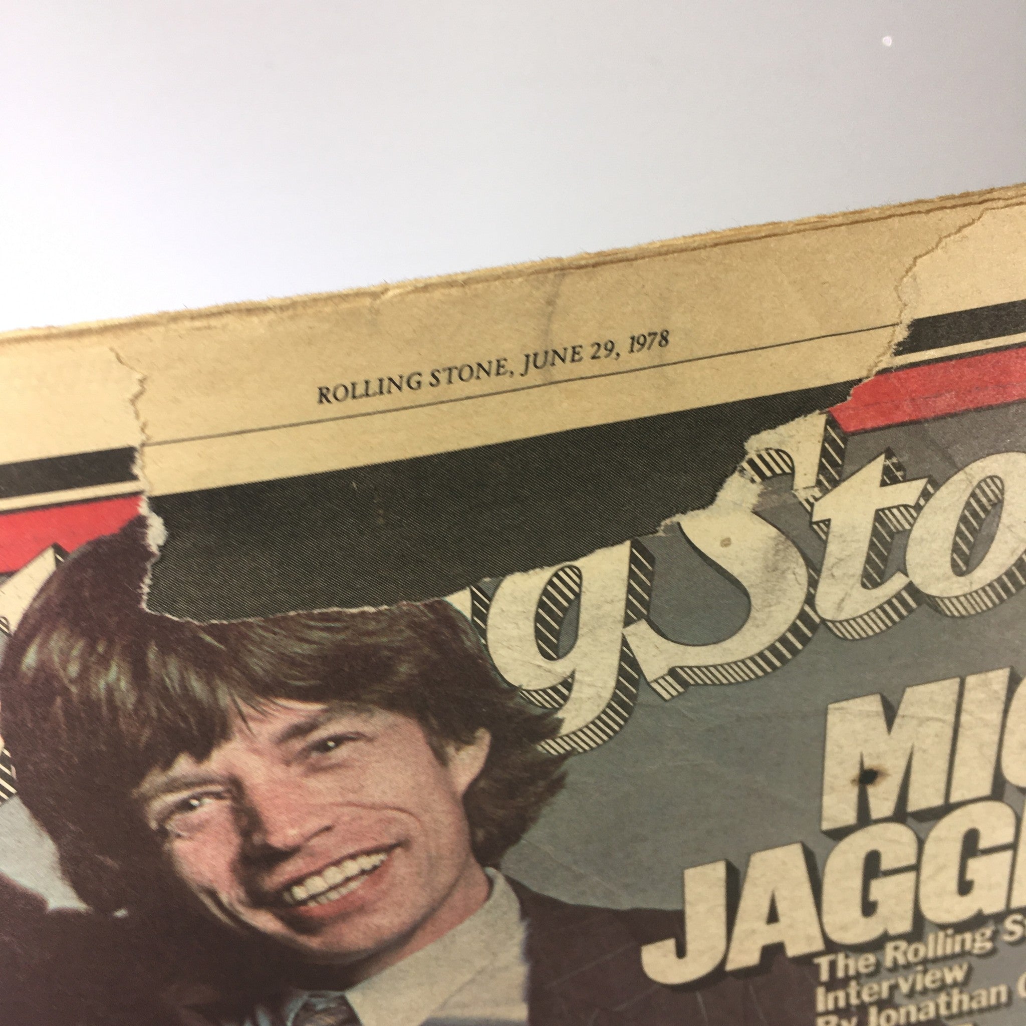 Close-up of the vintage Rolling Stone Magazine cover dated June 29, 1978, featuring notable wear and a small tear at the top, highlighting the issue's collectibility.