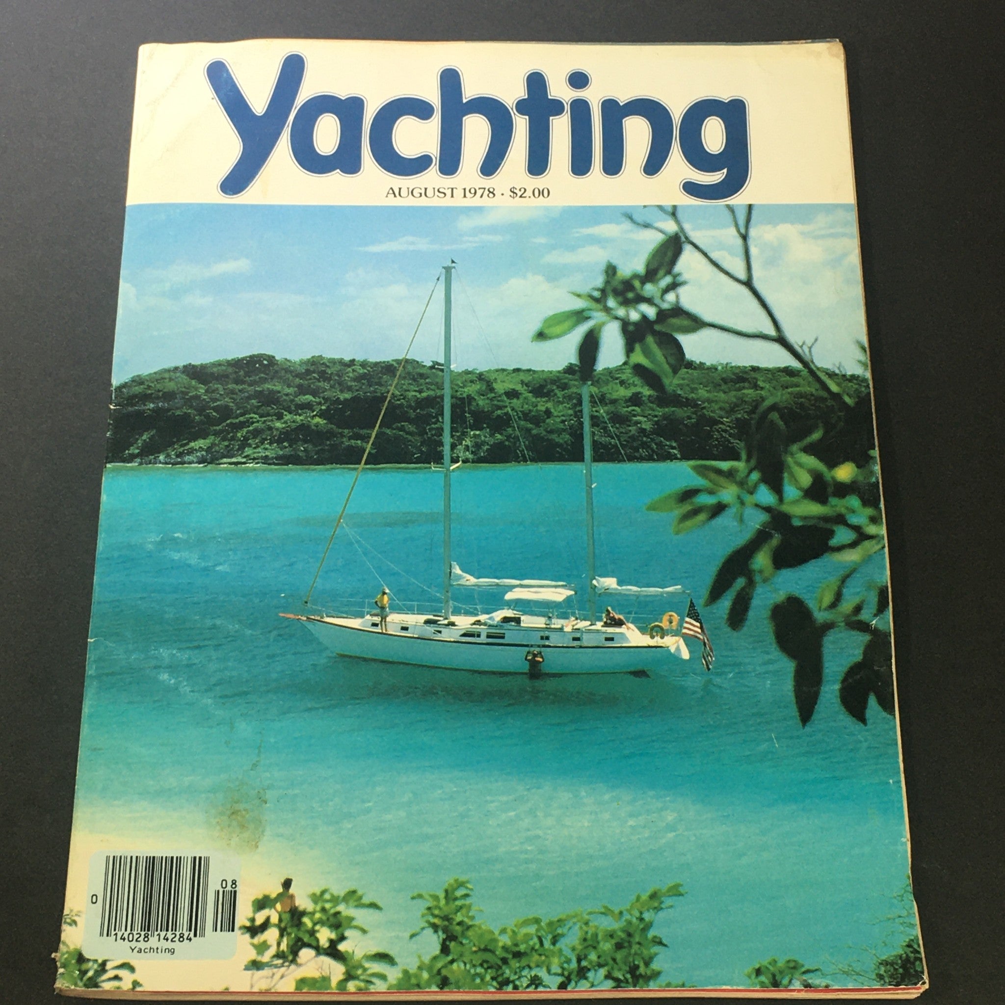 Cover of VTG Yachting Magazine August 1978 featuring a sailboat in serene waters, highlighting the theme 'Chartering Dreams For The Taking'.