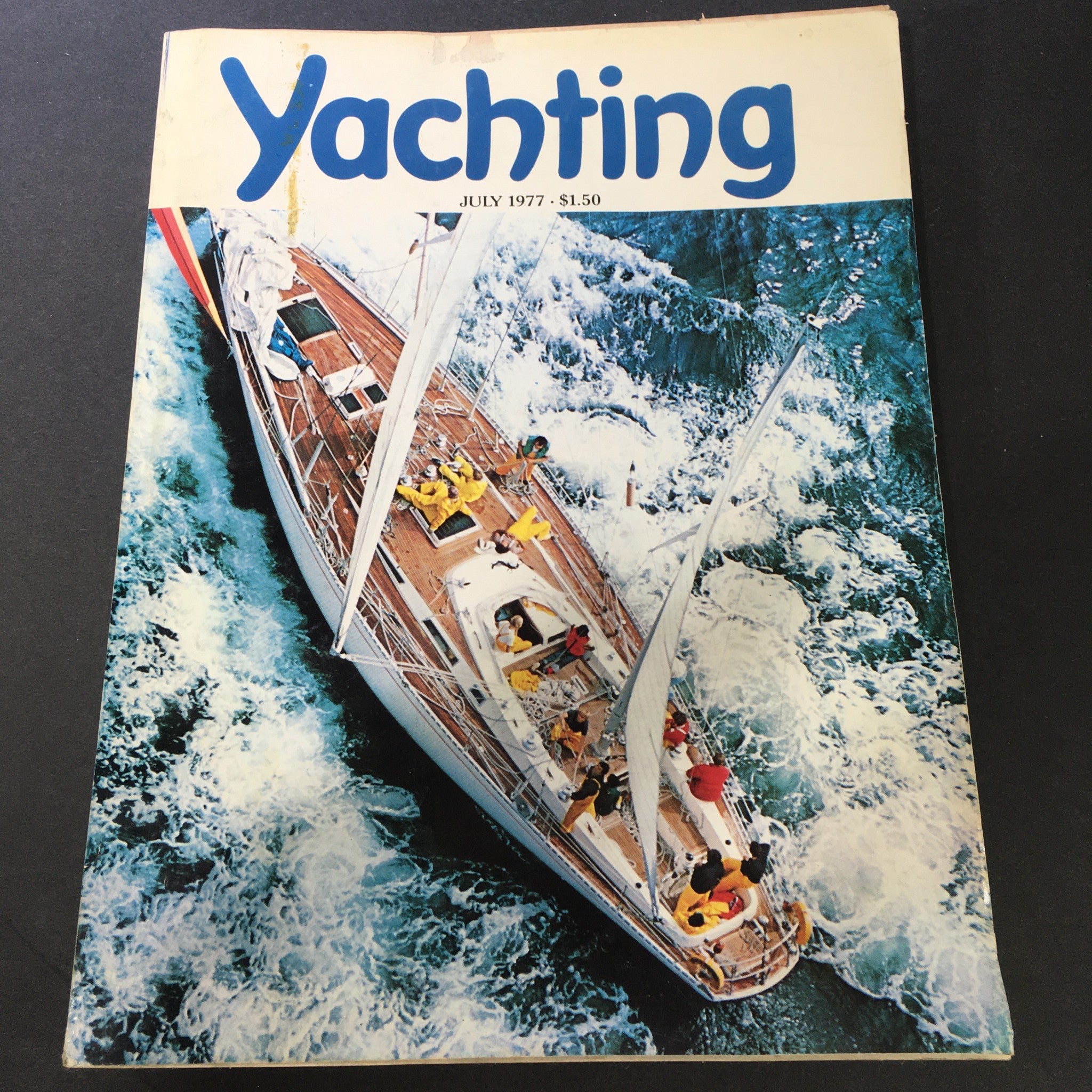 Cover of Yachting Magazine July 1977 featuring a sailing boat in the Western Caribbean with vibrant imagery and a classic design.