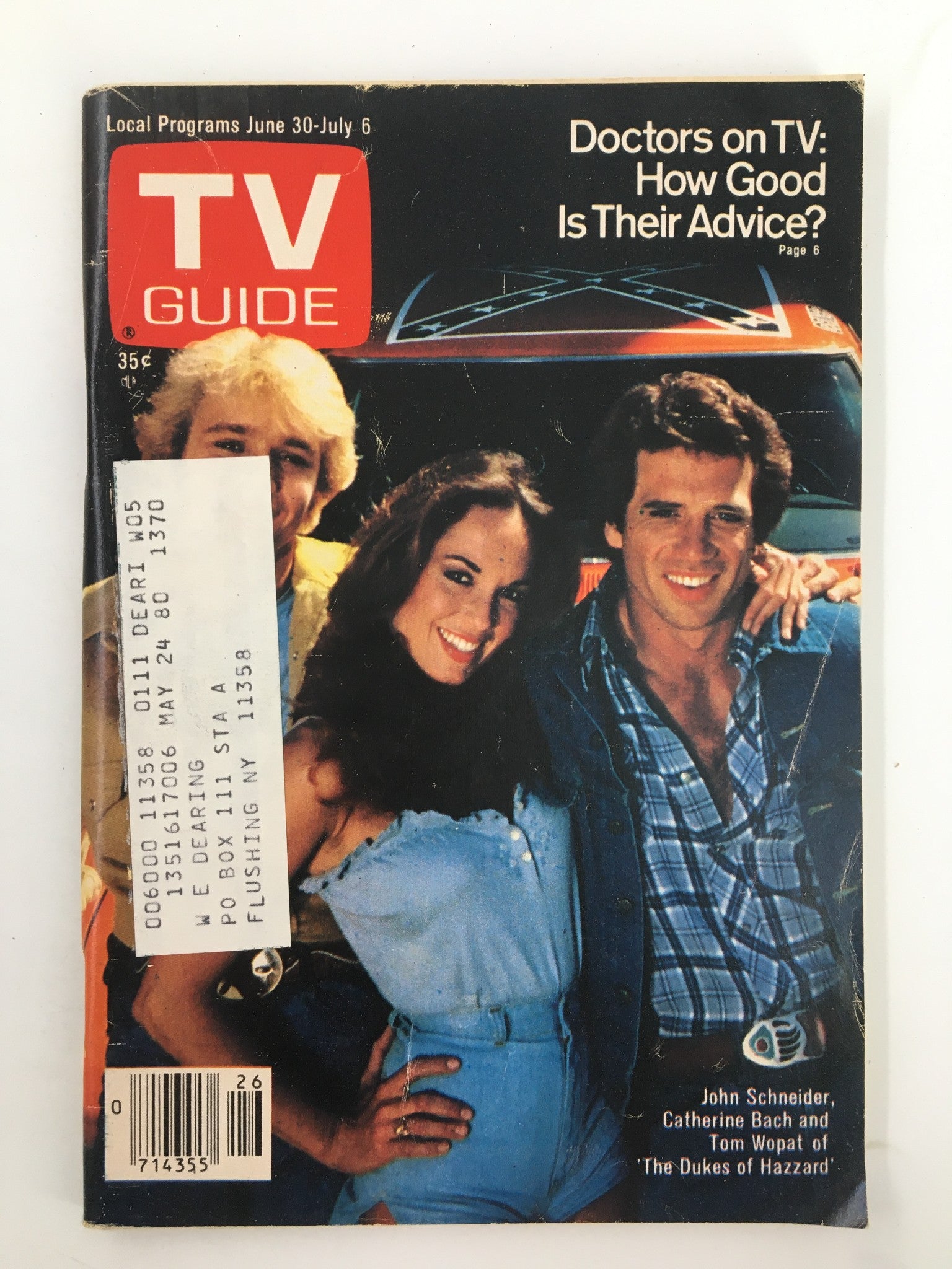 Cover of TV Guide Magazine June 30, 1979 featuring John Schneider, Catherine Bach, and Tom Wopat from 'The Dukes of Hazzard'.